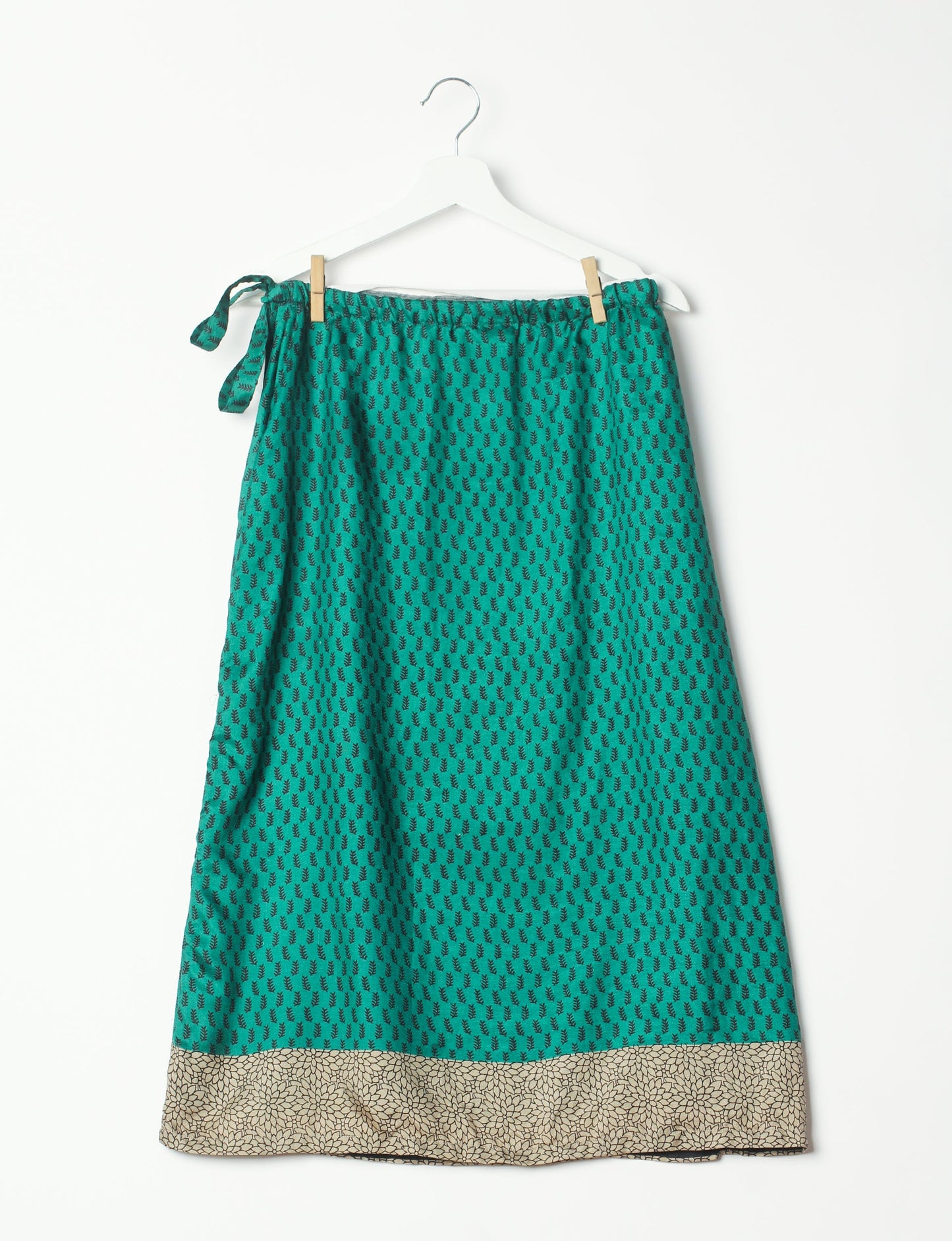 Versatile and sustainable LONG WRAPAROUND SKIRT, mid-calf length, defying convention and suitable for all waist sizes. Elevate your style with this eco-friendly and comfortable piece, creating a unique and inclusive fashion experience.