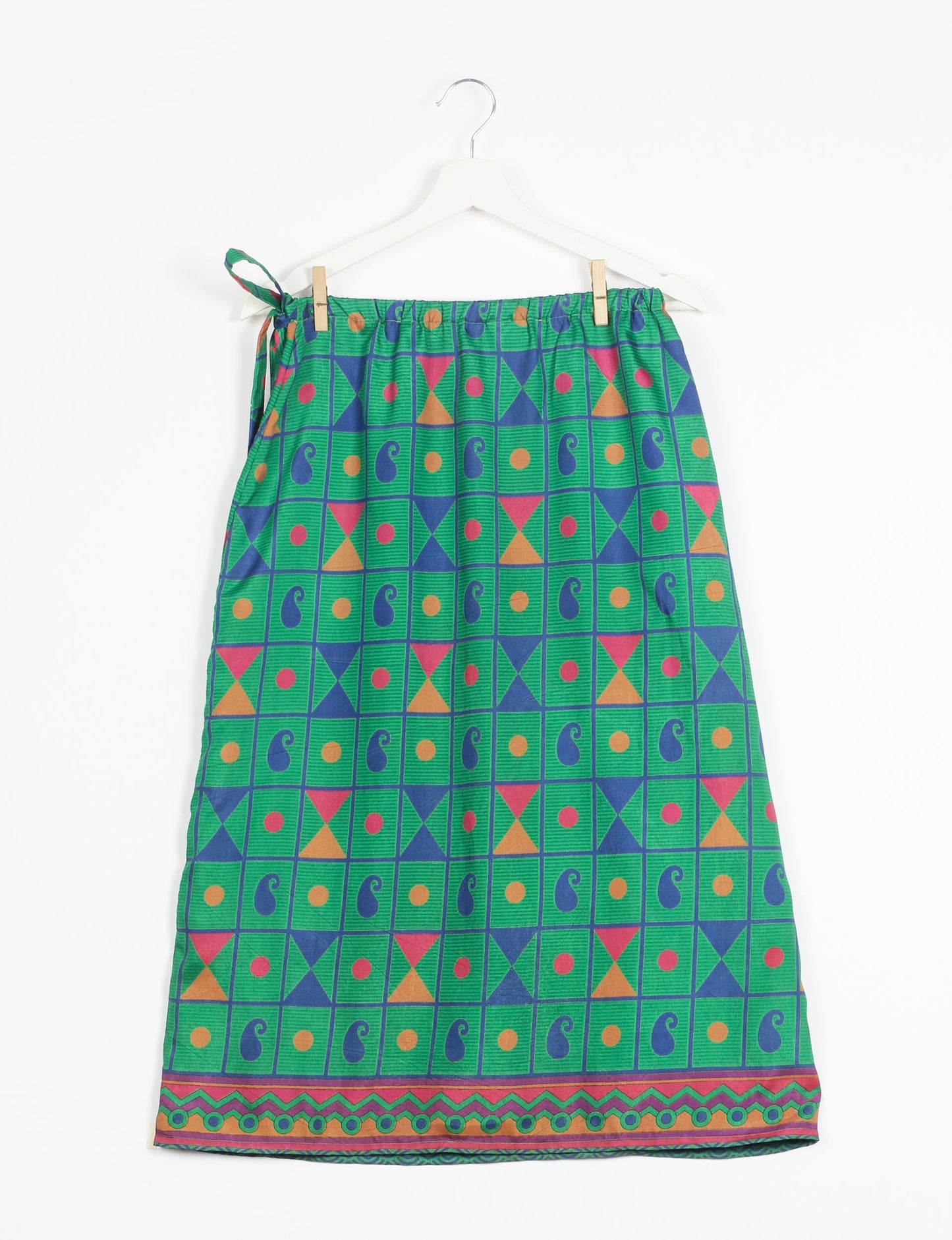 Versatile and sustainable LONG WRAPAROUND SKIRT, mid-calf length, defying convention and suitable for all waist sizes. Elevate your style with this eco-friendly and comfortable piece, creating a unique and inclusive fashion experience.