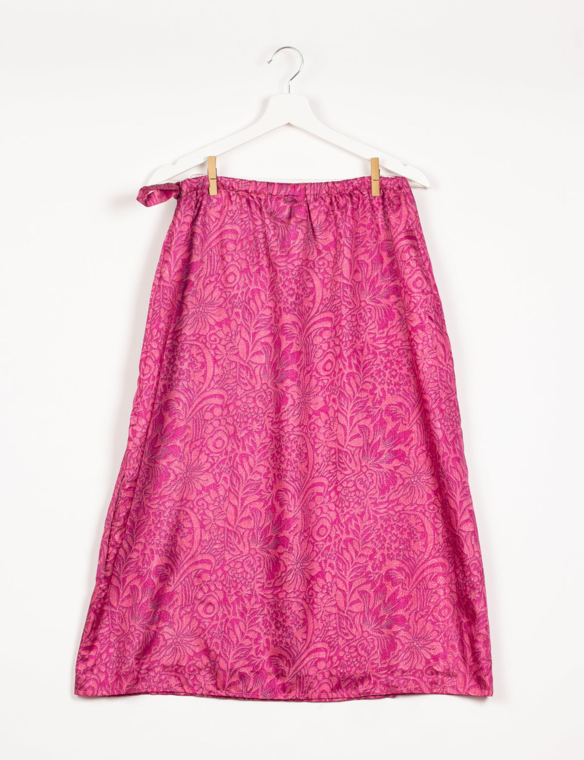 Versatile and sustainable LONG WRAPAROUND SKIRT, mid-calf length, defying convention and suitable for all waist sizes. Elevate your style with this eco-friendly and comfortable piece, creating a unique and inclusive fashion experience.