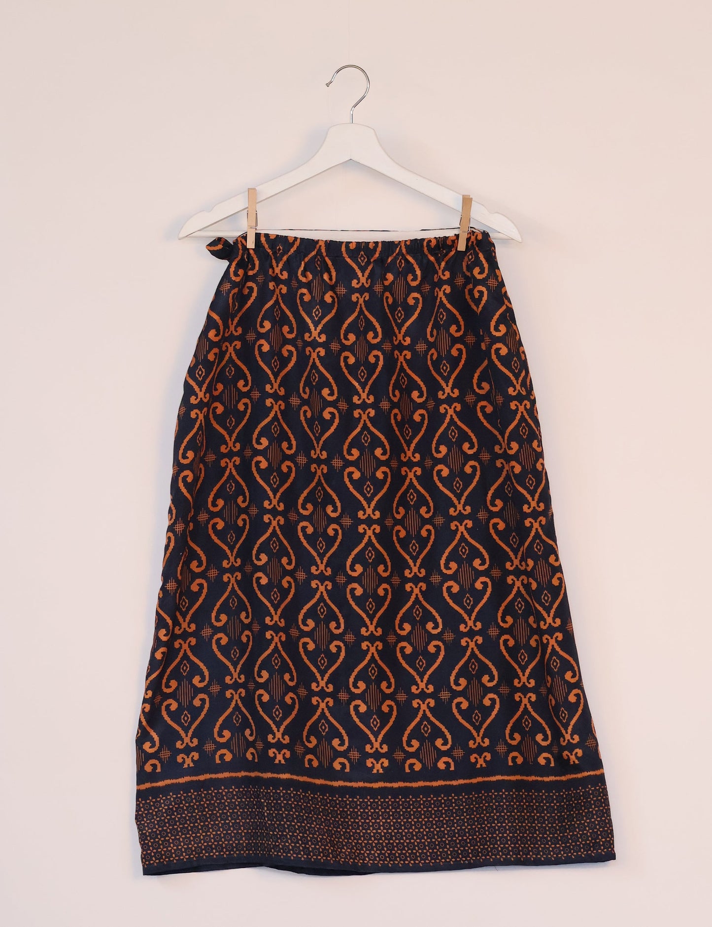 Versatile and sustainable LONG WRAPAROUND SKIRT, mid-calf length, defying convention and suitable for all waist sizes. Elevate your style with this eco-friendly and comfortable piece, creating a unique and inclusive fashion experience.