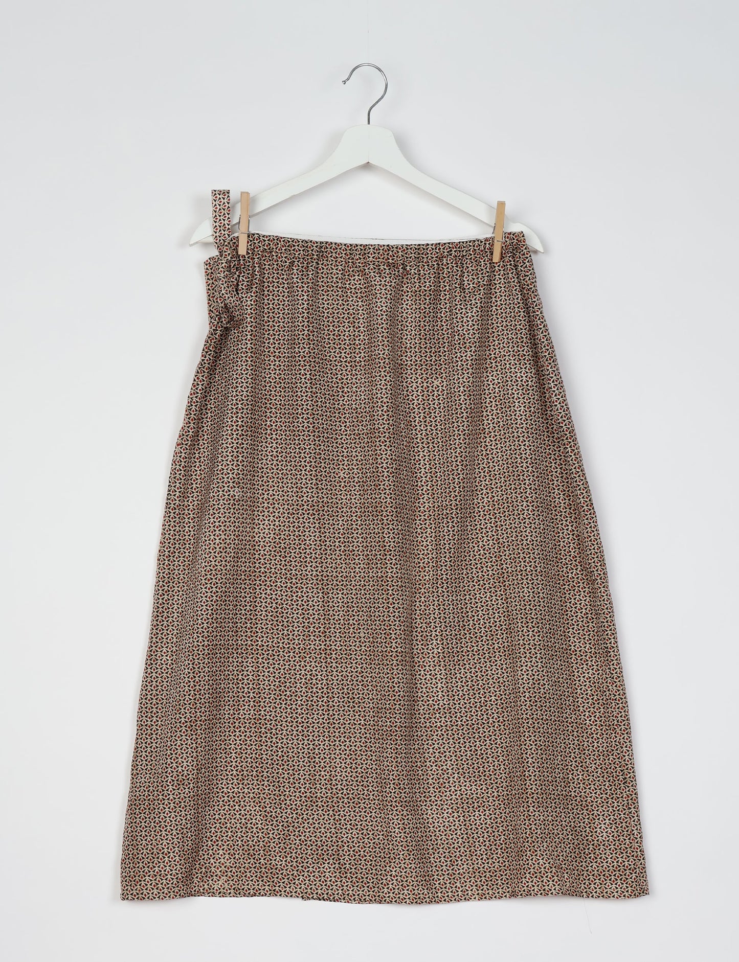 Versatile and sustainable LONG WRAPAROUND SKIRT, mid-calf length, defying convention and suitable for all waist sizes. Elevate your style with this eco-friendly and comfortable piece, creating a unique and inclusive fashion experience.