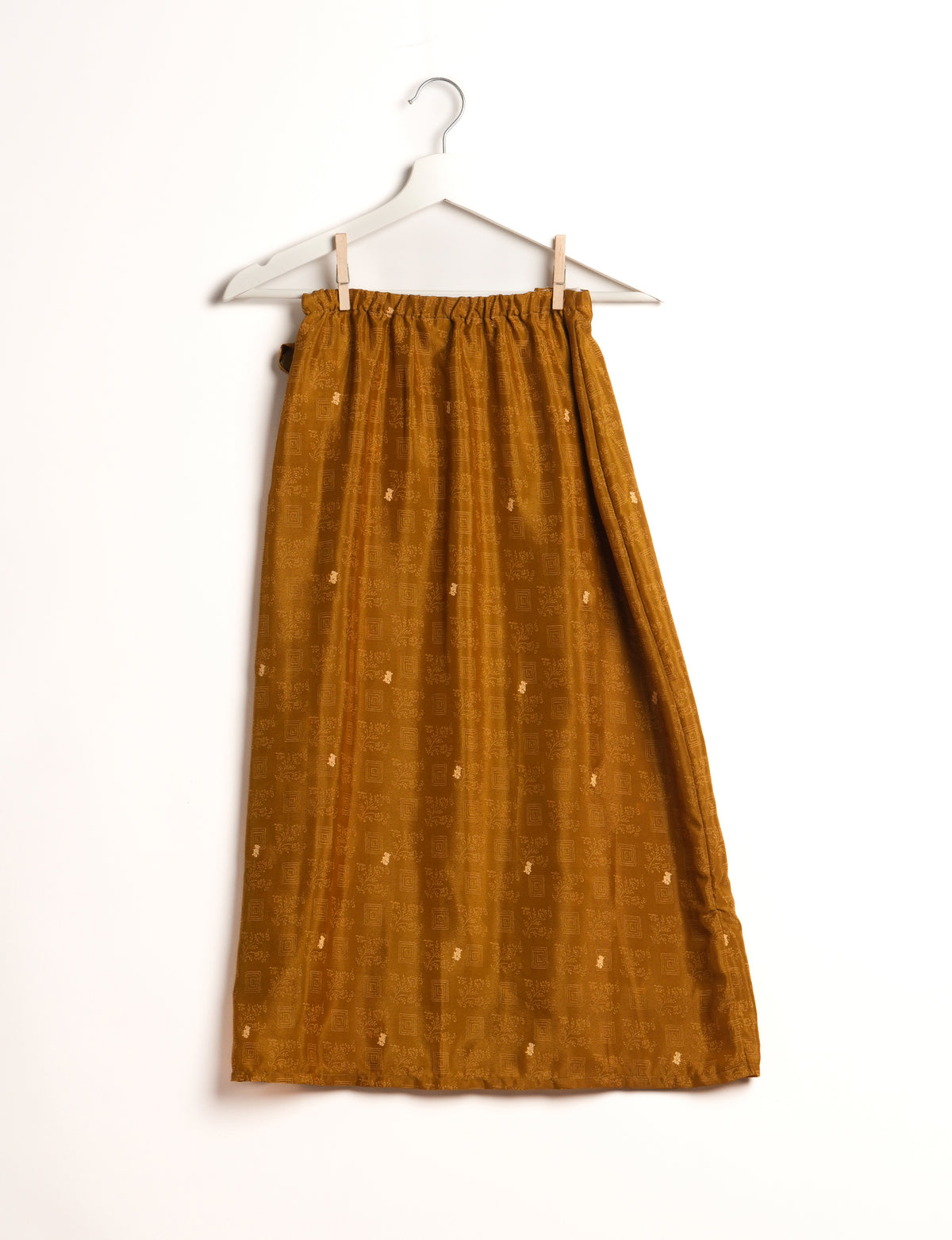 Versatile and sustainable LONG WRAPAROUND SKIRT, mid-calf length, defying convention and suitable for all waist sizes. Elevate your style with this eco-friendly and comfortable piece, creating a unique and inclusive fashion experience.