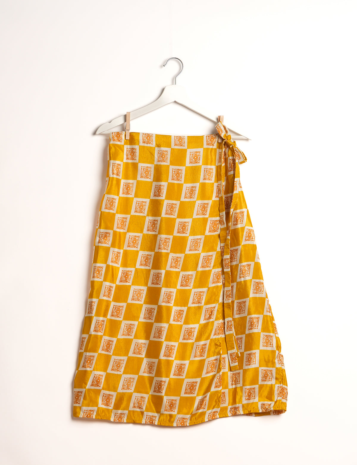Versatile and sustainable LONG WRAPAROUND SKIRT, mid-calf length, defying convention and suitable for all waist sizes. Elevate your style with this eco-friendly and comfortable piece, creating a unique and inclusive fashion experience.
