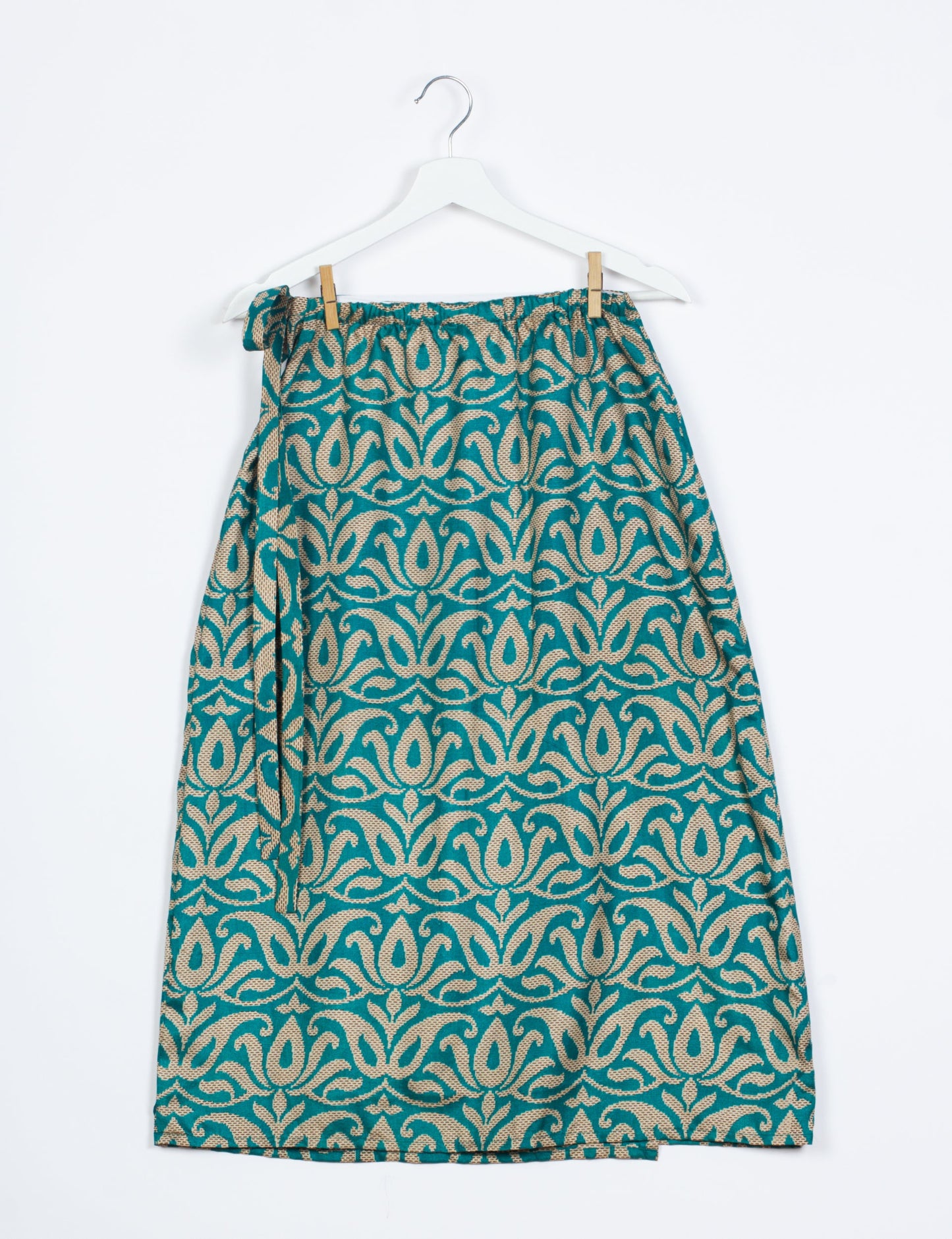 Versatile and sustainable LONG WRAPAROUND SKIRT, mid-calf length, defying convention and suitable for all waist sizes. Elevate your style with this eco-friendly and comfortable piece, creating a unique and inclusive fashion experience.