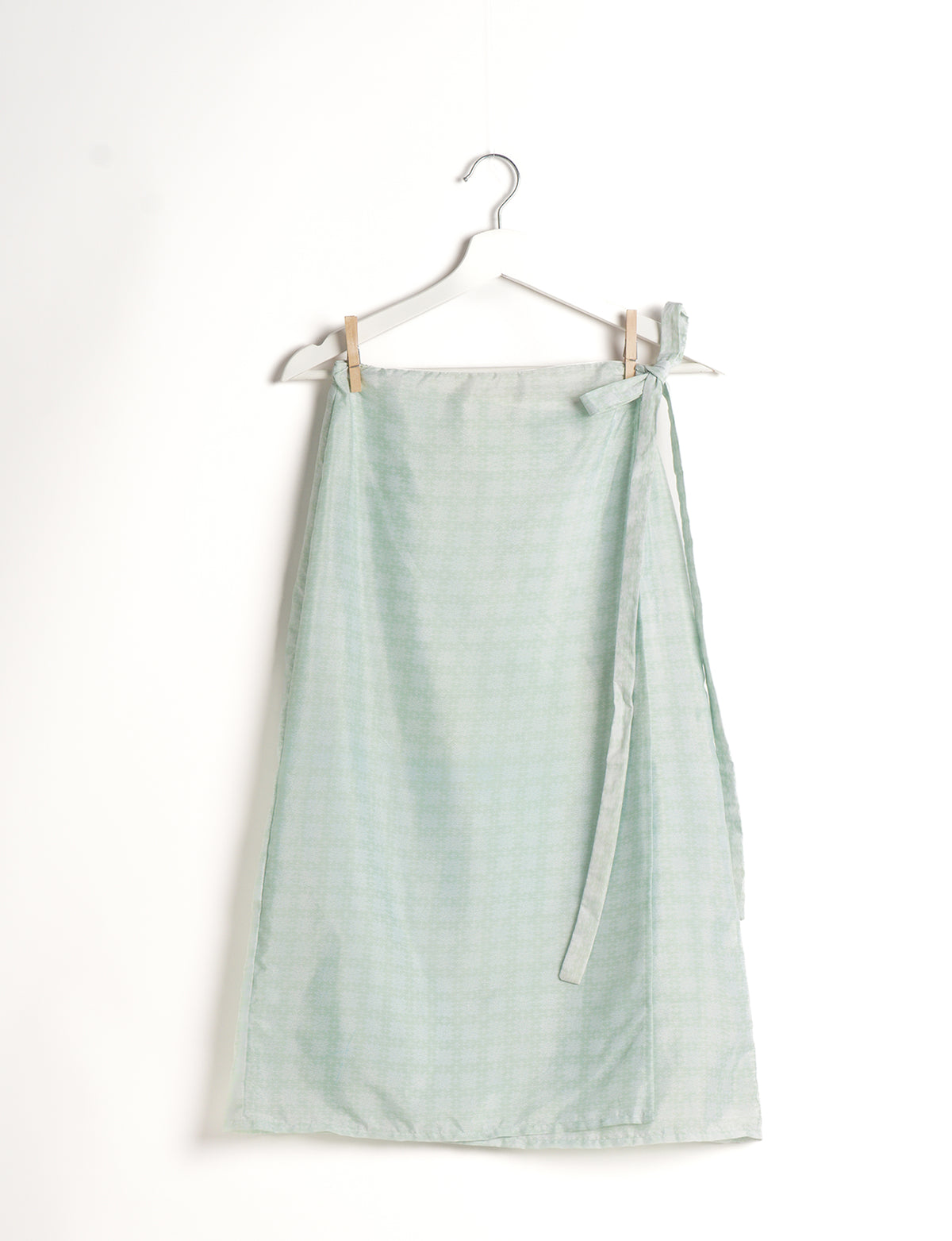 Versatile and sustainable LONG WRAPAROUND SKIRT, mid-calf length, defying convention and suitable for all waist sizes. Elevate your style with this eco-friendly and comfortable piece, creating a unique and inclusive fashion experience.