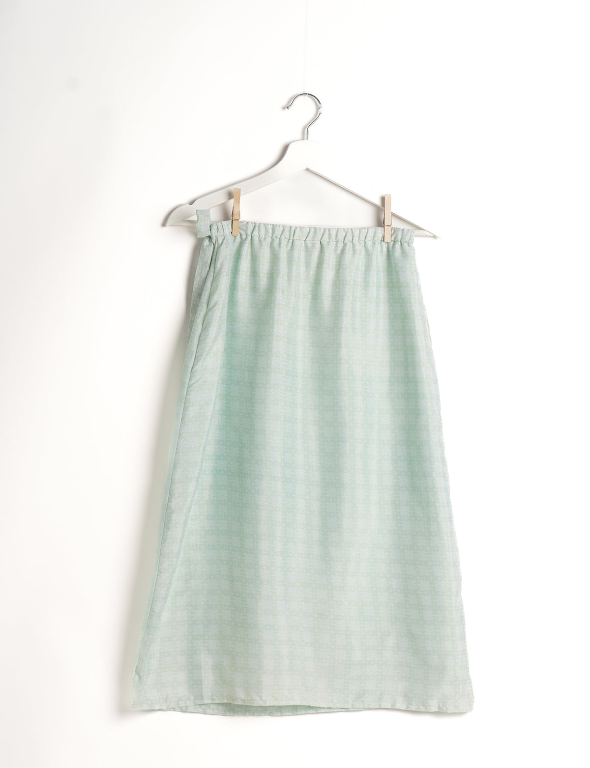 Versatile and sustainable LONG WRAPAROUND SKIRT, mid-calf length, defying convention and suitable for all waist sizes. Elevate your style with this eco-friendly and comfortable piece, creating a unique and inclusive fashion experience.