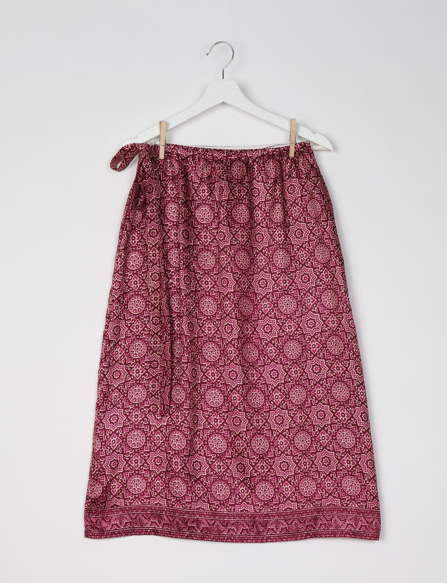 Versatile and sustainable LONG WRAPAROUND SKIRT, mid-calf length, defying convention and suitable for all waist sizes. Elevate your style with this eco-friendly and comfortable piece, creating a unique and inclusive fashion experience.