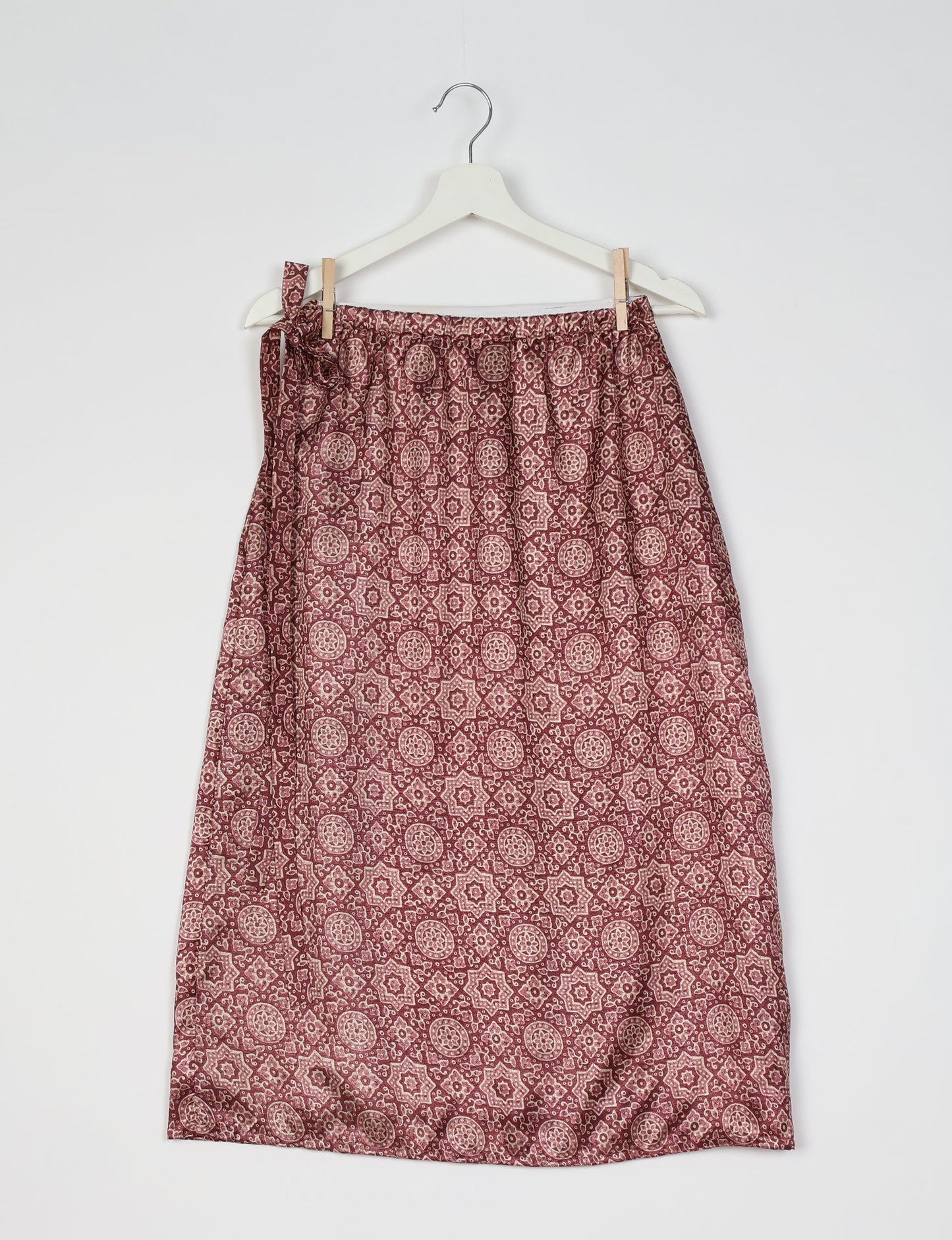 Versatile and sustainable LONG WRAPAROUND SKIRT, mid-calf length, defying convention and suitable for all waist sizes. Elevate your style with this eco-friendly and comfortable piece, creating a unique and inclusive fashion experience.