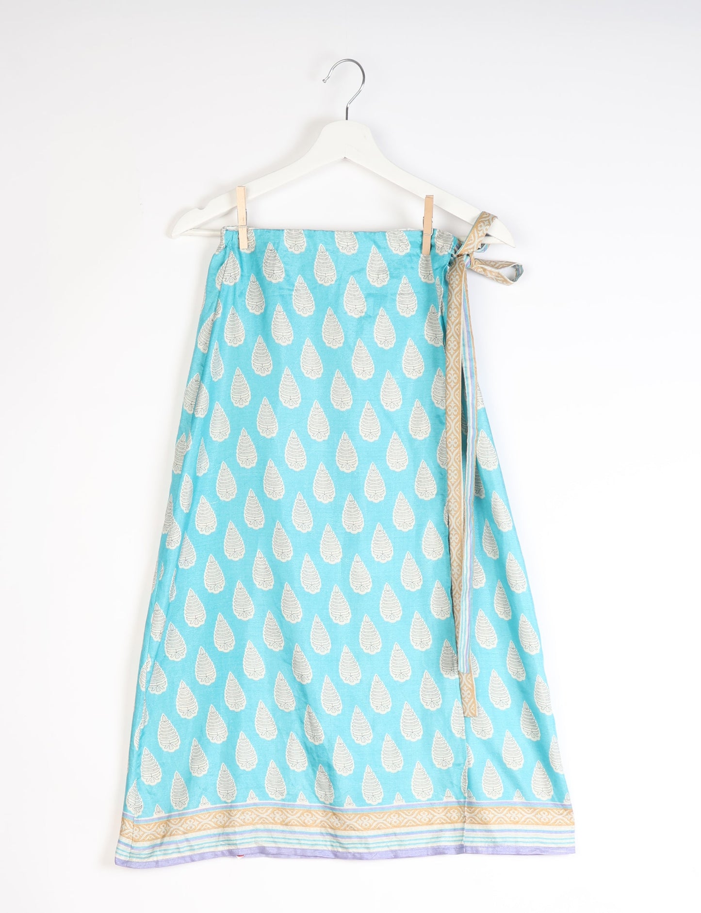 Versatile and sustainable LONG WRAPAROUND SKIRT, mid-calf length, defying convention and suitable for all waist sizes. Elevate your style with this eco-friendly and comfortable piece, creating a unique and inclusive fashion experience.