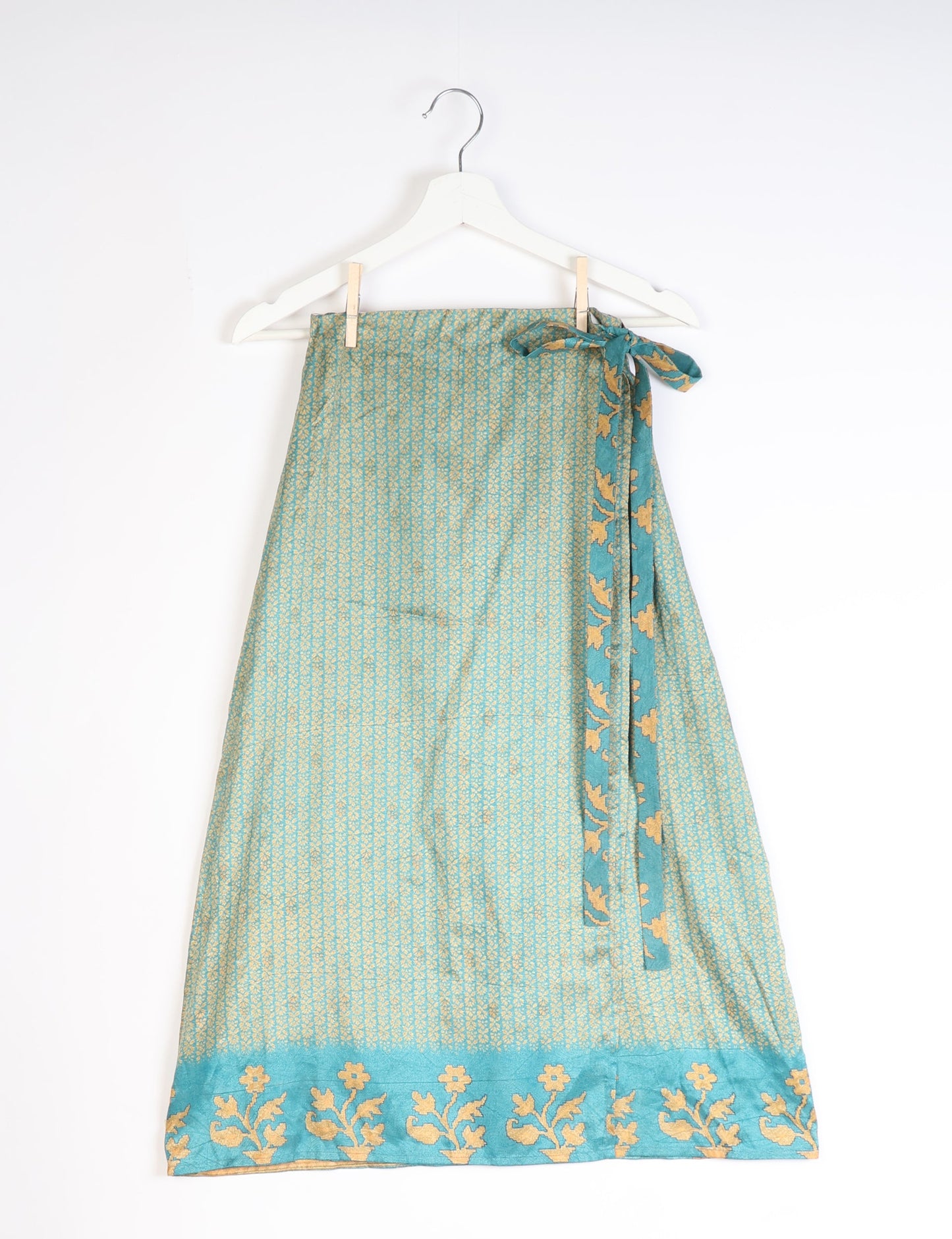 Versatile and sustainable LONG WRAPAROUND SKIRT, mid-calf length, defying convention and suitable for all waist sizes. Elevate your style with this eco-friendly and comfortable piece, creating a unique and inclusive fashion experience.