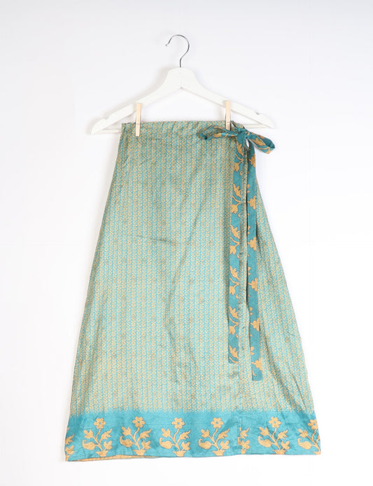 Versatile and sustainable LONG WRAPAROUND SKIRT, mid-calf length, defying convention and suitable for all waist sizes. Elevate your style with this eco-friendly and comfortable piece, creating a unique and inclusive fashion experience.