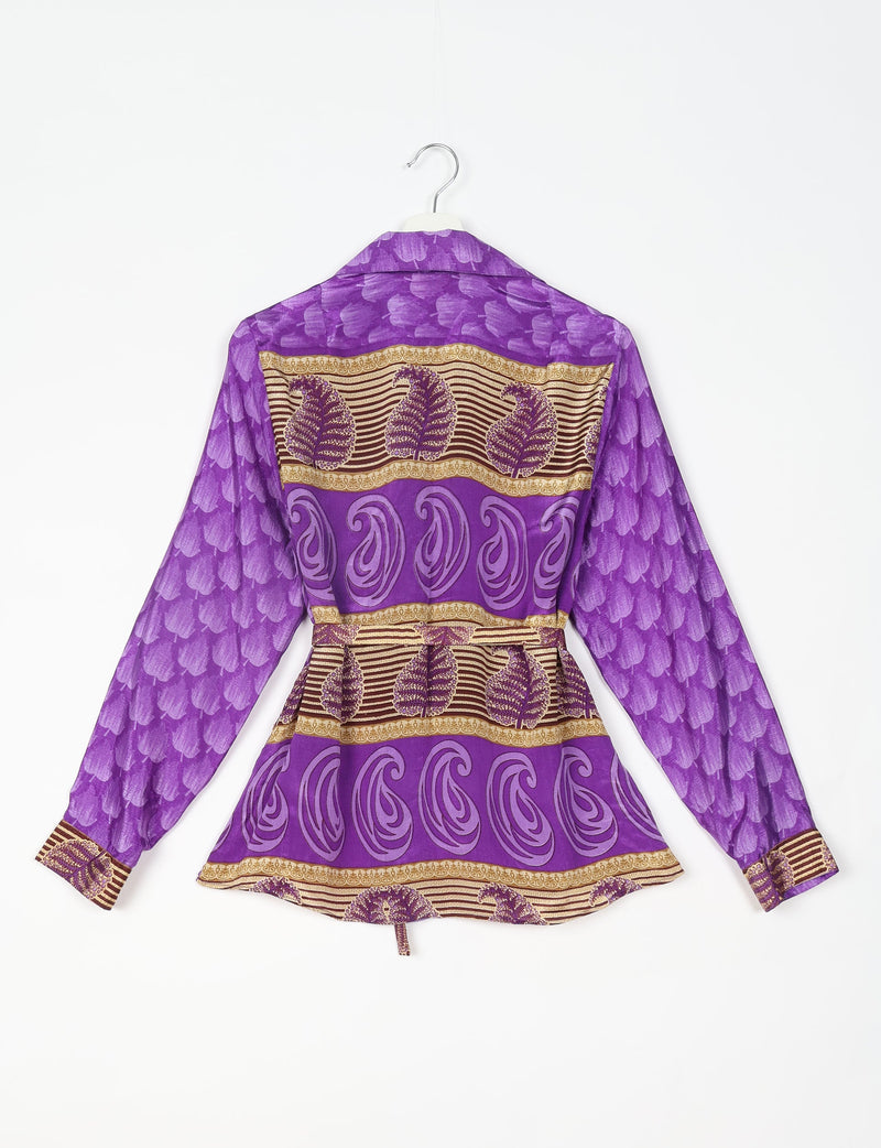 Purple long-sleeve shirt with leaf and swirl patterns in gold and brown, shown from back on a hanger