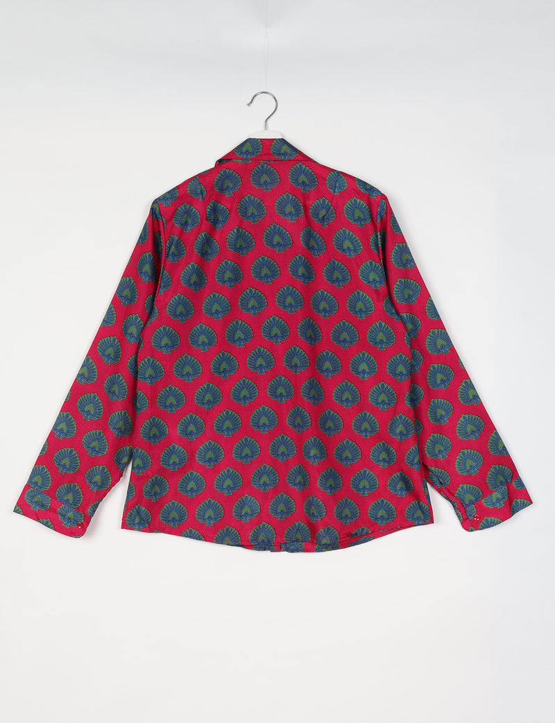 Red long-sleeve shirt with blue and green leaf pattern, shown from back on white hanger against white background