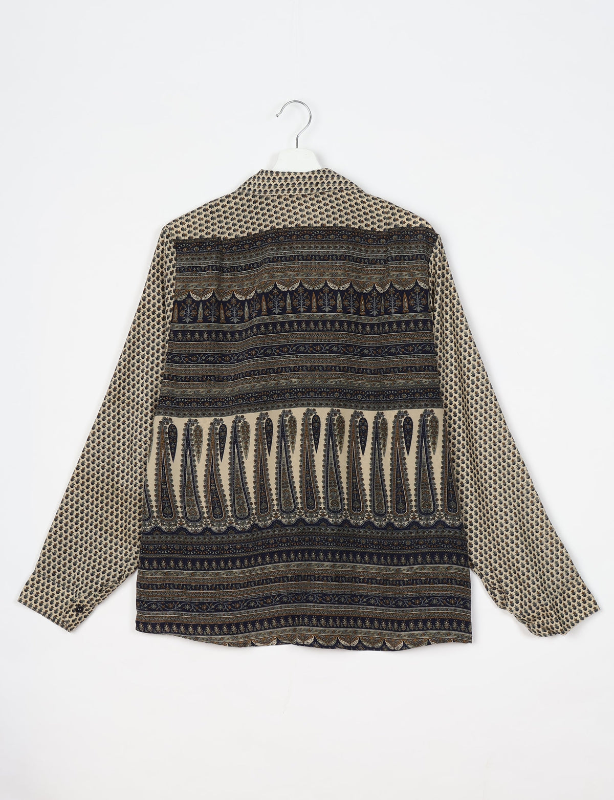 Beige long-sleeve shirt with black and brown intricate micro and paisley print, shown from back on white hanger