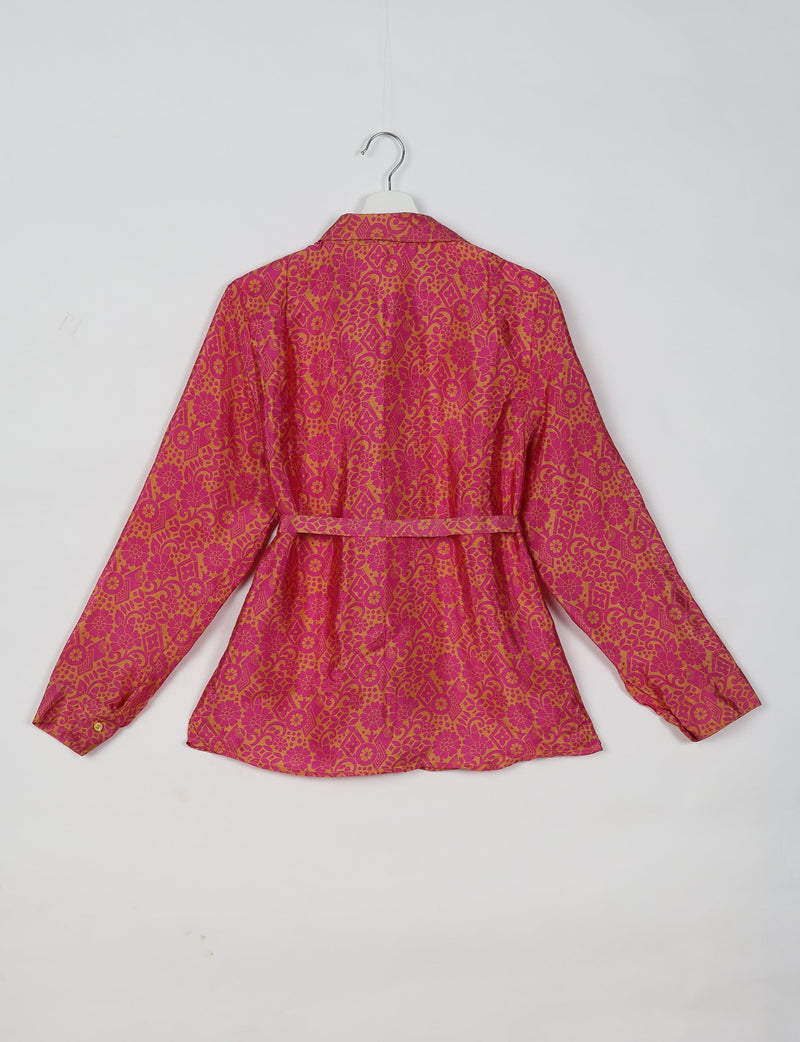 Pink tropical patterned long-sleeve shirt with collar and belt, shown from back on white hanger against white background