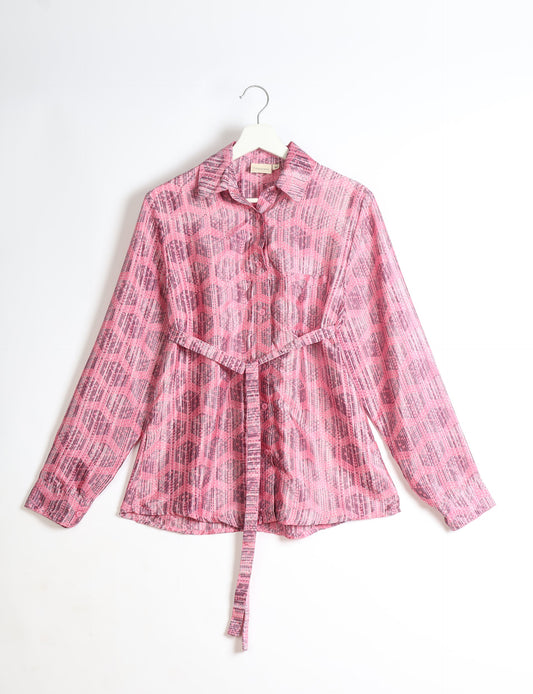 Experience sustainable fashion with our classic slim-fit shirt, crafted with ethical and green values. The shirt, designed for minimal waste, features a tie-up waist belt or neck tie, semi-spread collar, and regular shirt cuffs. Versatile and eco-friendly, wear it tucked in, unbuttoned over a tank top, or knotted at the waist for a unique style.