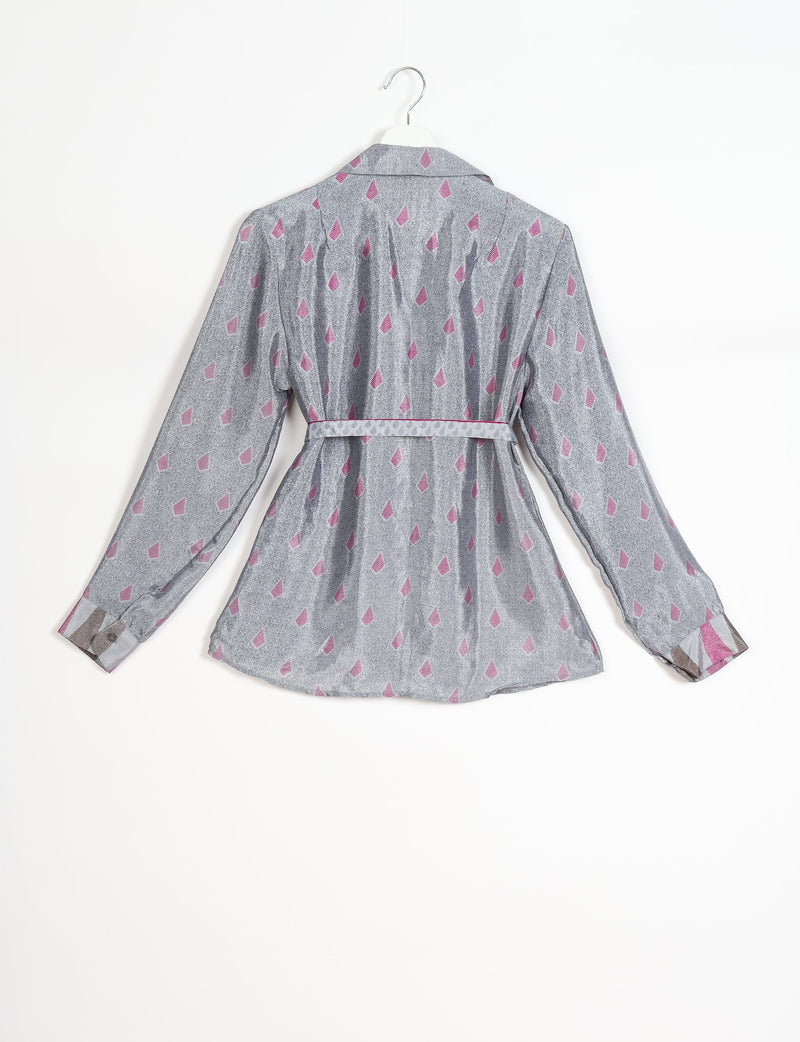 Grey long-sleeve shirt with pink geometric micro design, belt at waist, and patterned cuffs, shown from back on hanger