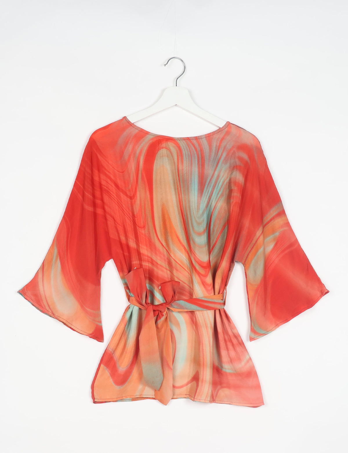 Upcycled women’s Belt Top made from pre-loved saris, showcasing eco friendly cloth, carbon neutral clothing, circular fashion design, environmentally friendly clothing, and second hand clothing elegance.