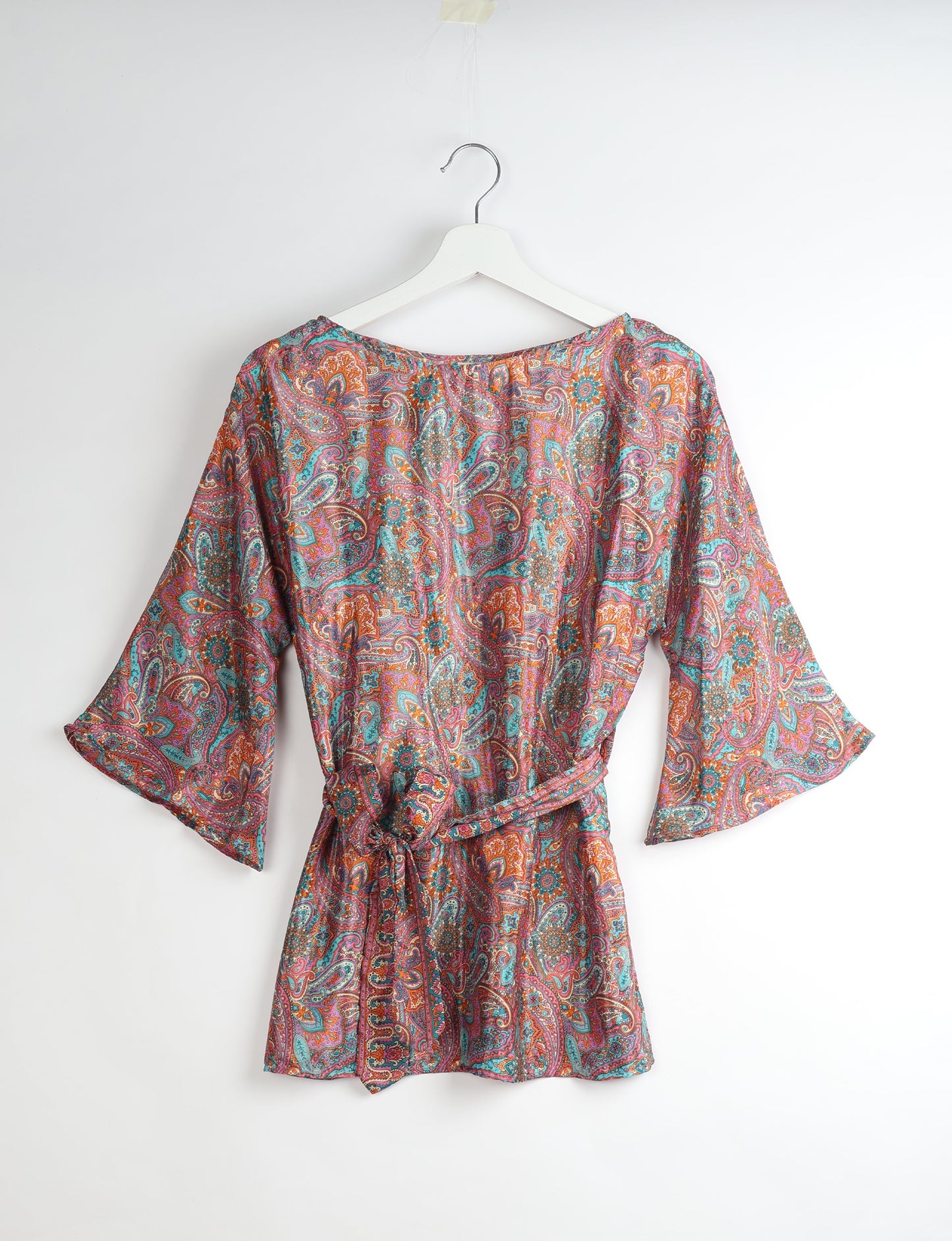 Upcycled women’s Belt Top made from pre-loved saris, showcasing eco friendly cloth, carbon neutral clothing, circular fashion design, environmentally friendly clothing, and second hand clothing elegance.