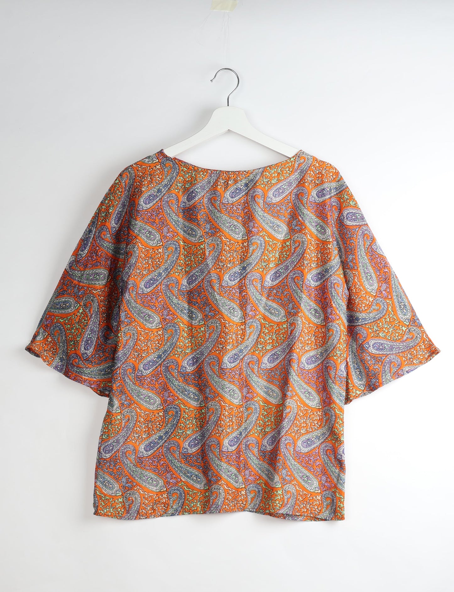 Upcycled women’s Belt Top made from pre-loved saris, showcasing eco friendly cloth, carbon neutral clothing, circular fashion design, environmentally friendly clothing, and second hand clothing elegance.