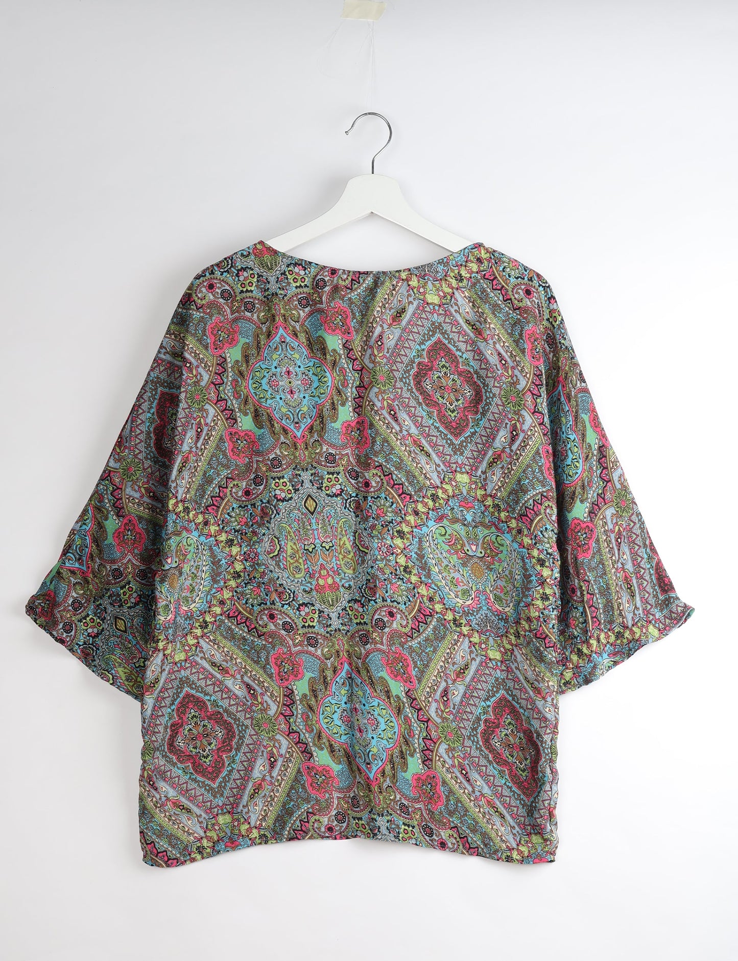 Upcycled women’s Belt Top made from pre-loved saris, showcasing eco friendly cloth, carbon neutral clothing, circular fashion design, environmentally friendly clothing, and second hand clothing elegance.