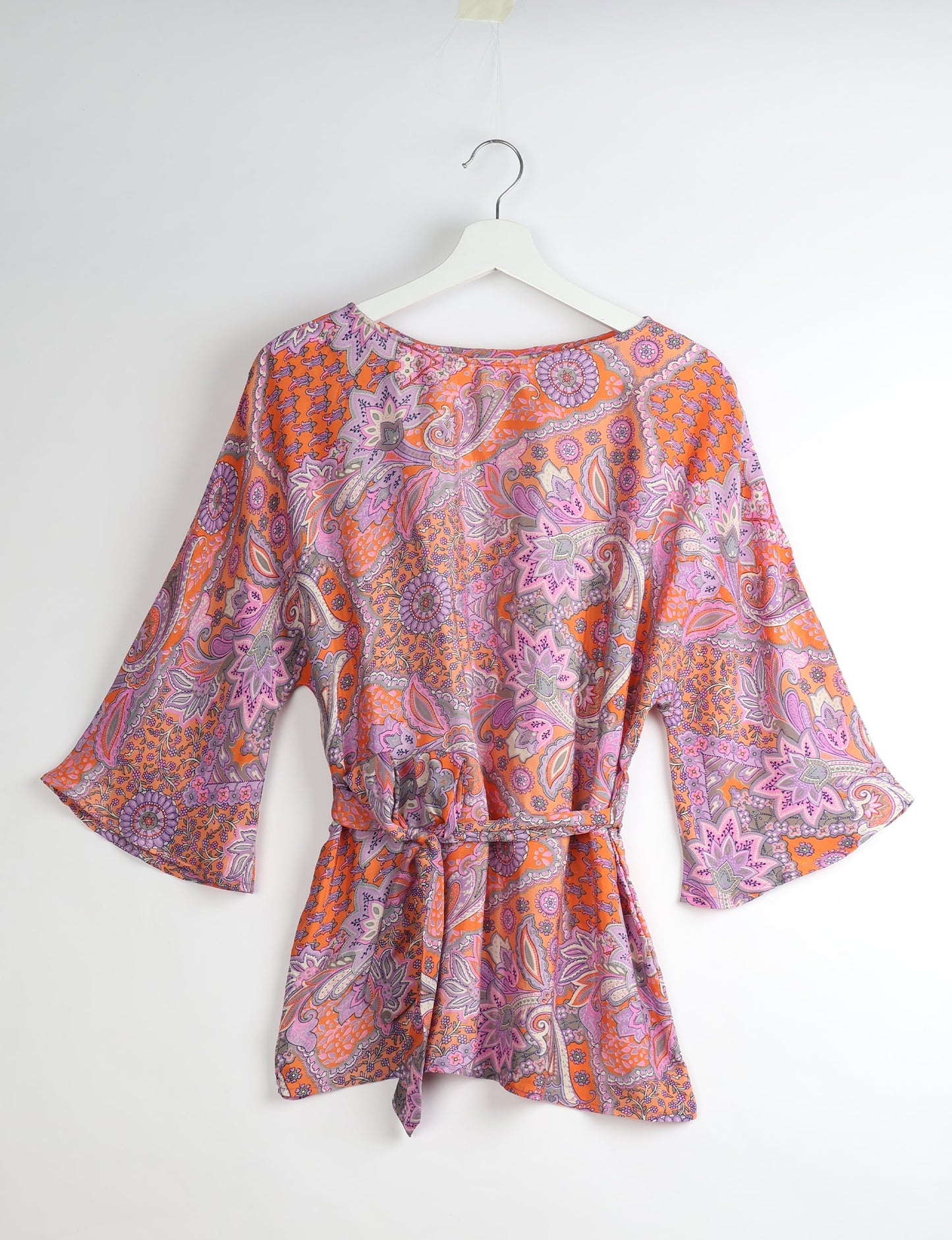 Upcycled women’s Belt Top made from pre-loved saris, showcasing eco friendly cloth, carbon neutral clothing, circular fashion design, environmentally friendly clothing, and second hand clothing elegance.