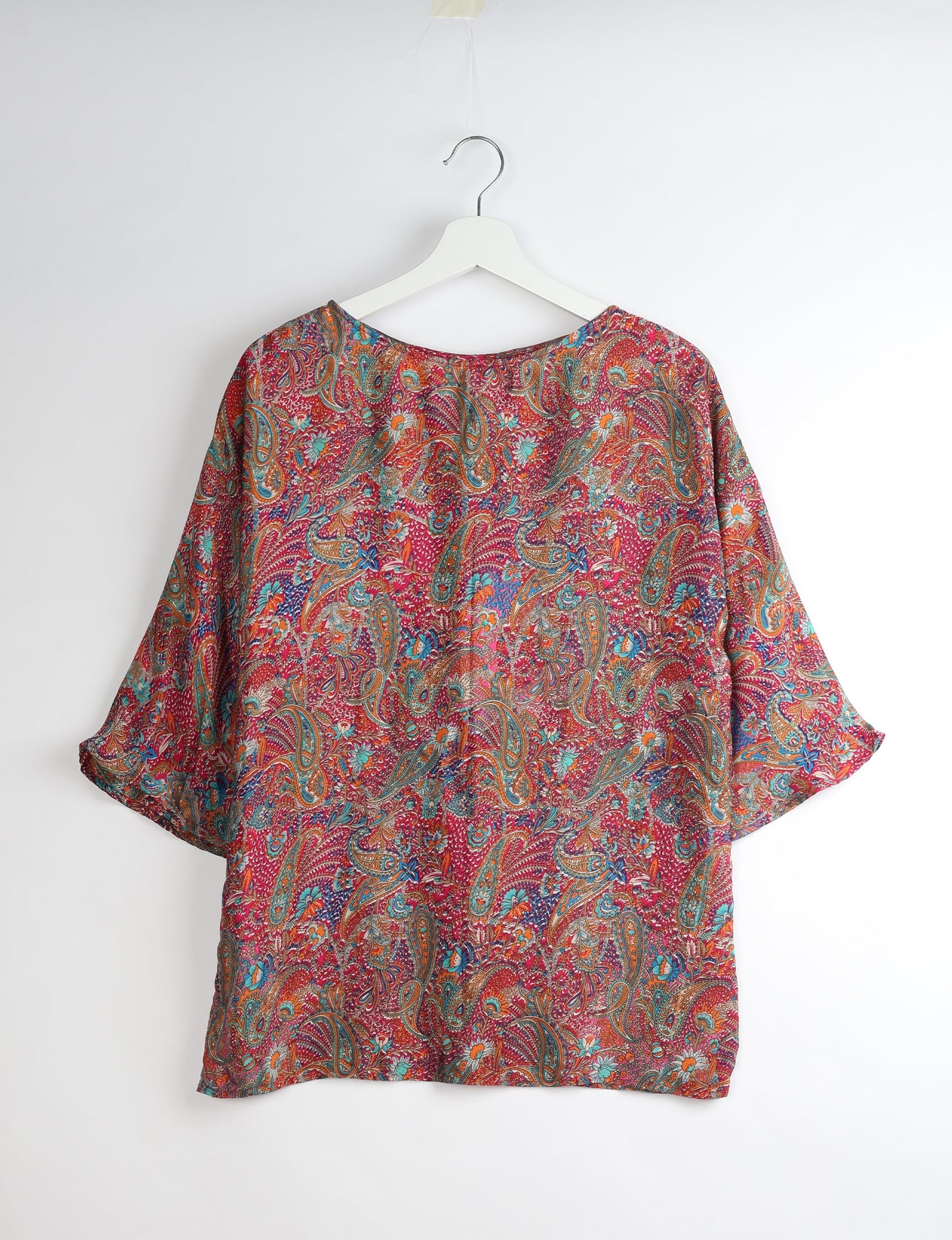 Upcycled women’s Belt Top made from pre-loved saris, showcasing eco friendly cloth, carbon neutral clothing, circular fashion design, environmentally friendly clothing, and second hand clothing elegance.