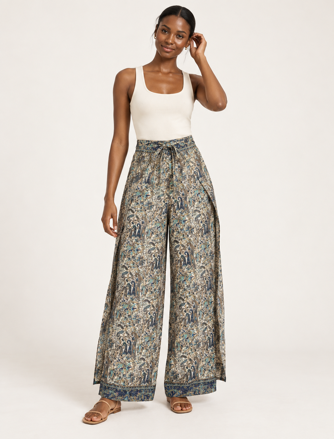 Immerse yourself in the vibrant allure of our PANTA PAREO – a distinctive piece made from handpicked, pre-worn saris, and carefully reworked by local artisans. This pareo is more than just a getaway must-have; it's a sustainable statement. Ideal as a layer over a bikini or a stylish throw, it brings eco-friendly charm to any room in your home. Embrace the colorful elegance of repurposed saris with the PANTA PAREO – an essential addition to your wardrobe for conscious and stylish living.