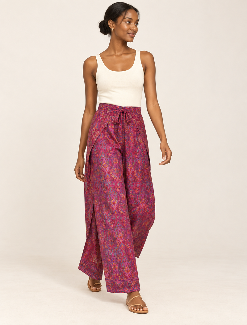 Immerse yourself in the vibrant allure of our PANTA PAREO – a distinctive piece made from handpicked, pre-worn saris, and carefully reworked by local artisans. This pareo is more than just a getaway must-have; it's a sustainable statement. Ideal as a layer over a bikini or a stylish throw, it brings eco-friendly charm to any room in your home. Embrace the colorful elegance of repurposed saris with the PANTA PAREO – an essential addition to your wardrobe for conscious and stylish living.