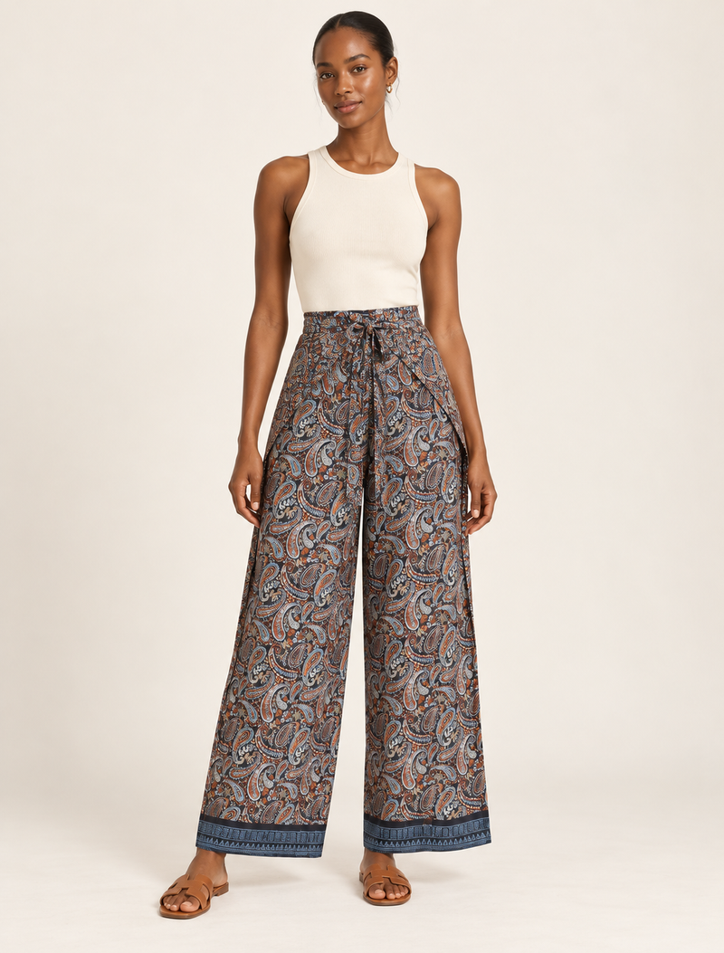 Immerse yourself in the vibrant allure of our PANTA PAREO – a distinctive piece made from handpicked, pre-worn saris, and carefully reworked by local artisans. This pareo is more than just a getaway must-have; it's a sustainable statement. Ideal as a layer over a bikini or a stylish throw, it brings eco-friendly charm to any room in your home. Embrace the colorful elegance of repurposed saris with the PANTA PAREO – an essential addition to your wardrobe for conscious and stylish living.