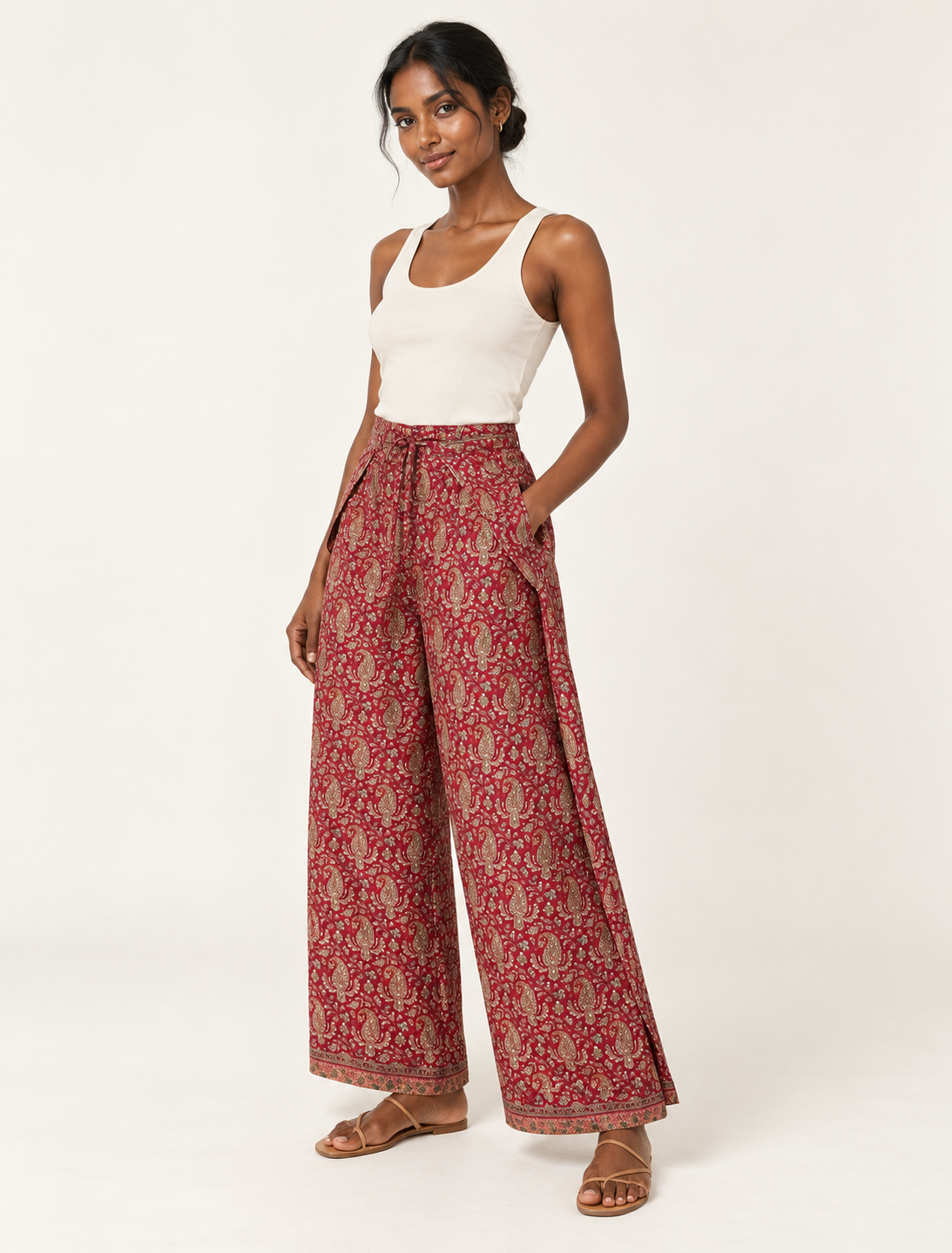 Immerse yourself in the vibrant allure of our PANTA PAREO – a distinctive piece made from handpicked, pre-worn saris, and carefully reworked by local artisans. This pareo is more than just a getaway must-have; it's a sustainable statement. Ideal as a layer over a bikini or a stylish throw, it brings eco-friendly charm to any room in your home. Embrace the colorful elegance of repurposed saris with the PANTA PAREO – an essential addition to your wardrobe for conscious and stylish living.