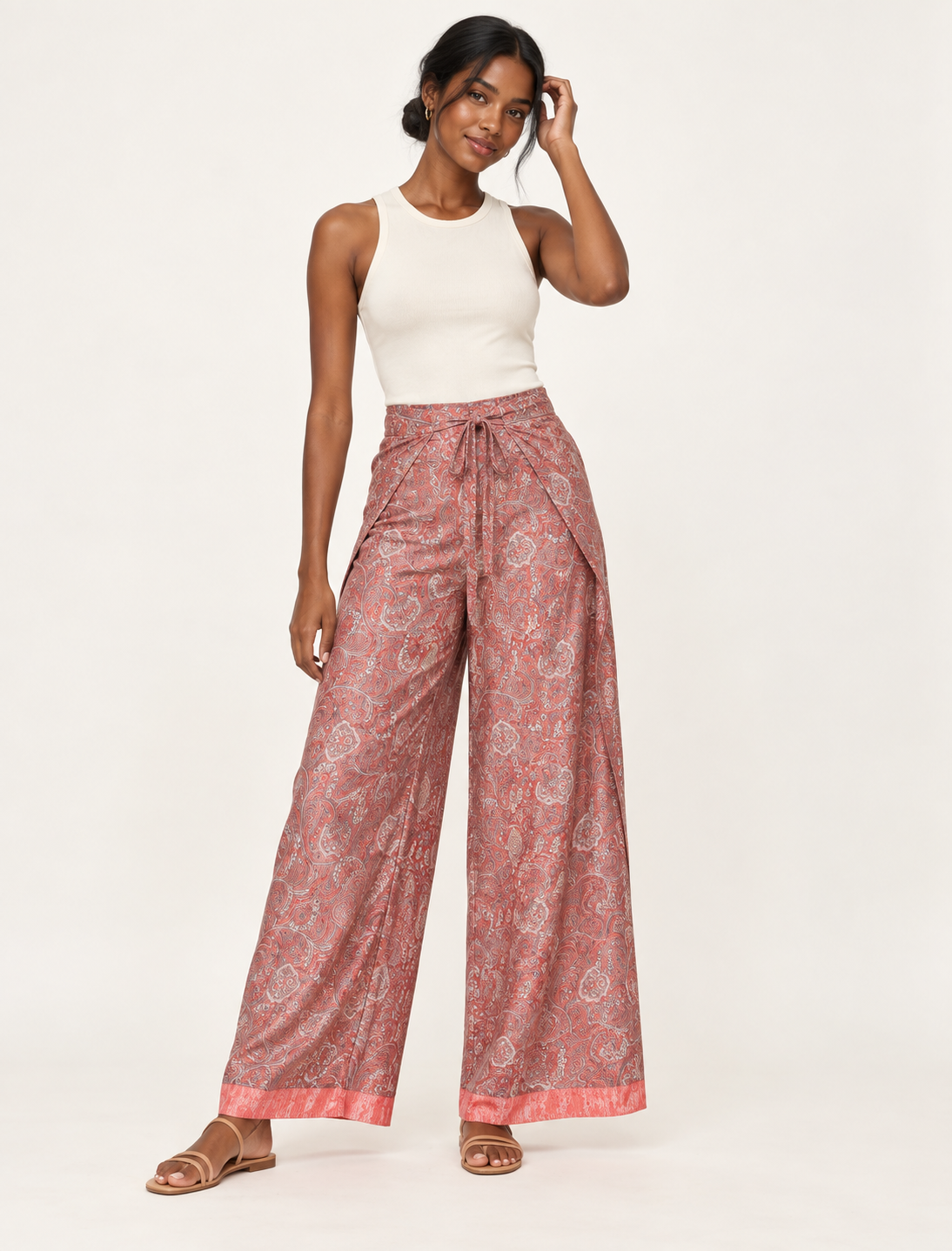 Immerse yourself in the vibrant allure of our PANTA PAREO – a distinctive piece made from handpicked, pre-worn saris, and carefully reworked by local artisans. This pareo is more than just a getaway must-have; it's a sustainable statement. Ideal as a layer over a bikini or a stylish throw, it brings eco-friendly charm to any room in your home. Embrace the colorful elegance of repurposed saris with the PANTA PAREO – an essential addition to your wardrobe for conscious and stylish living.