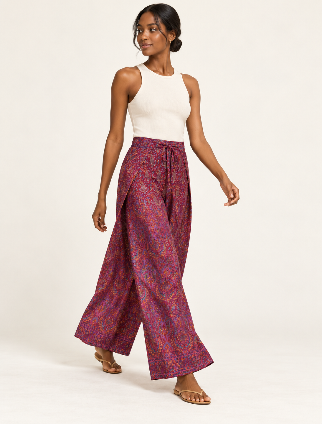 Immerse yourself in the vibrant allure of our PANTA PAREO – a distinctive piece made from handpicked, pre-worn saris, and carefully reworked by local artisans. This pareo is more than just a getaway must-have; it's a sustainable statement. Ideal as a layer over a bikini or a stylish throw, it brings eco-friendly charm to any room in your home. Embrace the colorful elegance of repurposed saris with the PANTA PAREO – an essential addition to your wardrobe for conscious and stylish living.