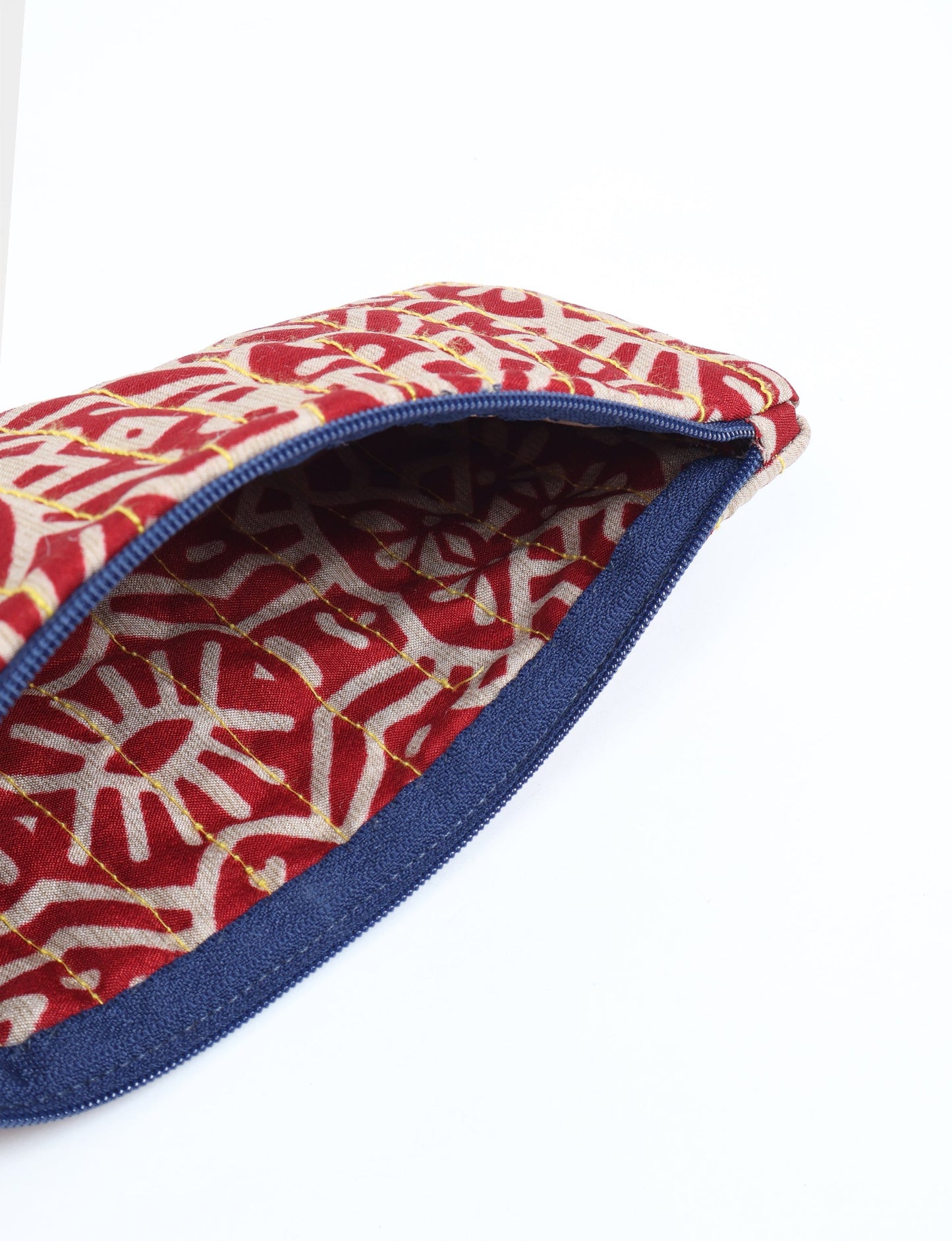 Quilted pencil pouch made from recycled clothing and repurposed textiles, promoting eco friendly fashion and circular fashion ideals. A durable, stylish storage option inspired by recycled sari products, upcycled women’s clothing, and earth friendly fashion practices.