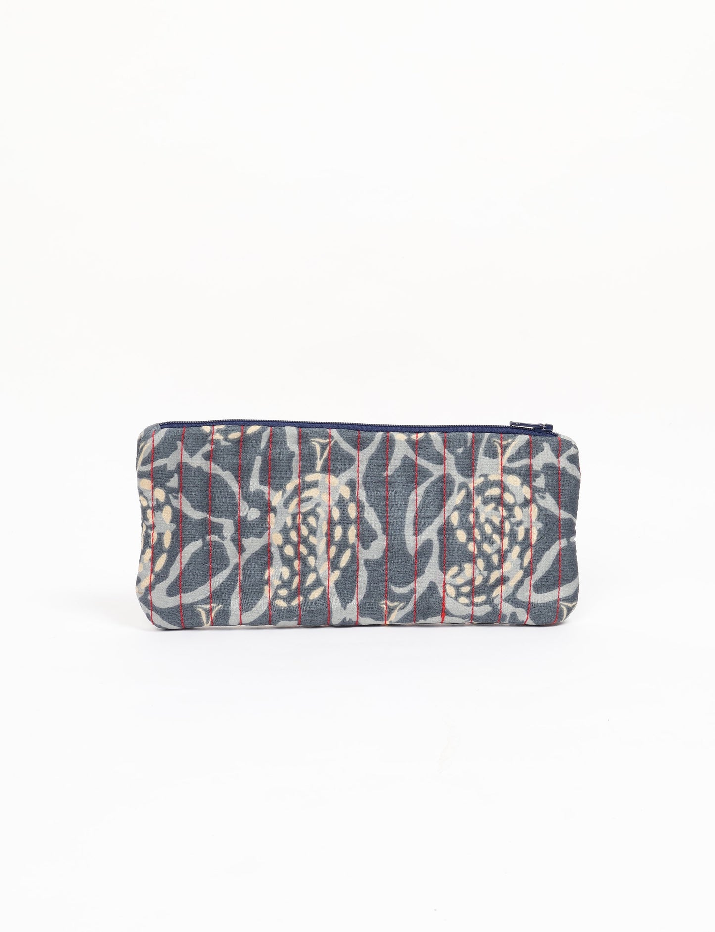 Quilted pencil pouch made from recycled clothing and repurposed textiles, promoting eco friendly fashion and circular fashion ideals. A durable, stylish storage option inspired by recycled sari products, upcycled women’s clothing, and earth friendly fashion practices.