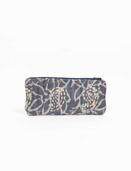 Quilted pencil pouch made from recycled clothing and repurposed textiles, promoting eco friendly fashion and circular fashion ideals. A durable, stylish storage option inspired by recycled sari products, upcycled women’s clothing, and earth friendly fashion practices.