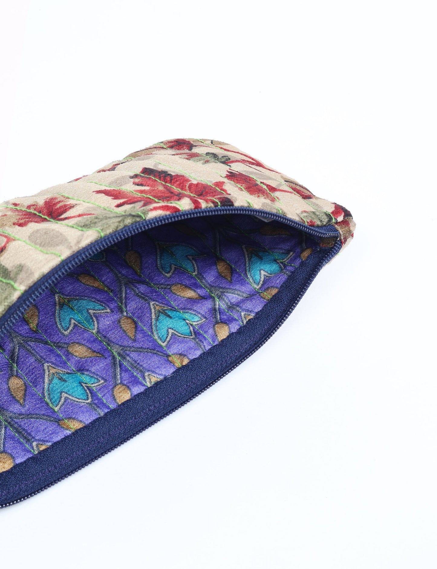 Quilted pencil pouch made from recycled clothing and repurposed textiles, promoting eco friendly fashion and circular fashion ideals. A durable, stylish storage option inspired by recycled sari products, upcycled women’s clothing, and earth friendly fashion practices.