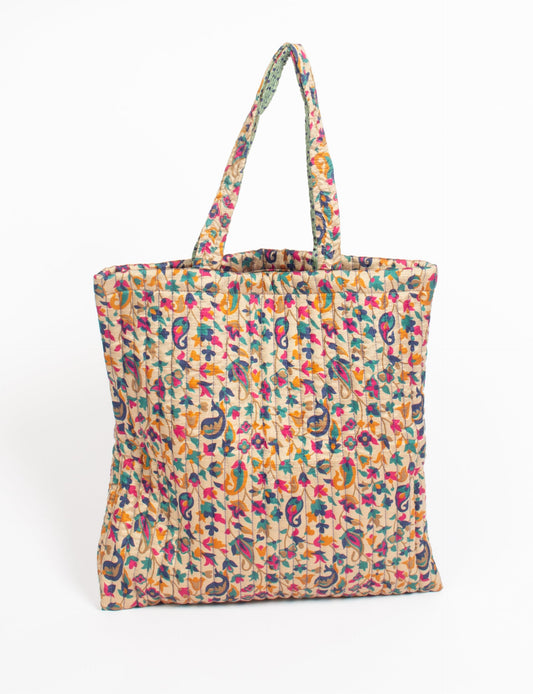 Elevate your style sustainably with our QUILTED SHOPPER BAG. Soft textures, vibrant colors, and a positive impact on people and the planet. Perfect for the office, shopping, or happy hour. Crafted from pre-loved saris for eco-conscious fashionistas!