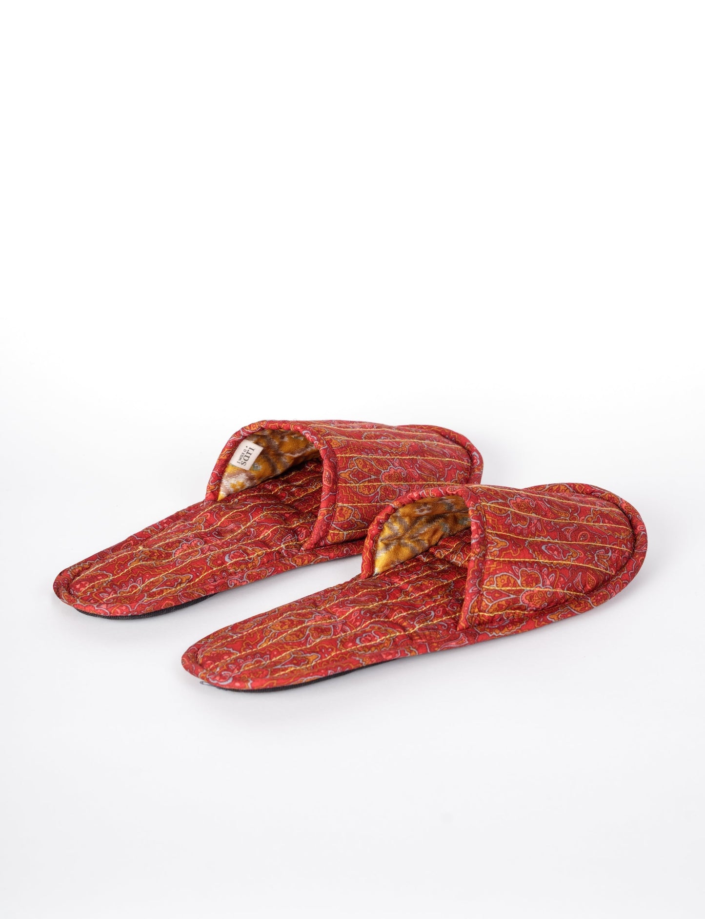 Elevate your downtime with our Quilted Slippers. Ethical, sustainable, and crafted by female artisans in Mumbai, these slippers offer cushioned comfort with a touch of chic style. Warm on the inside, fashionable on the outside, step into sustainable luxury.