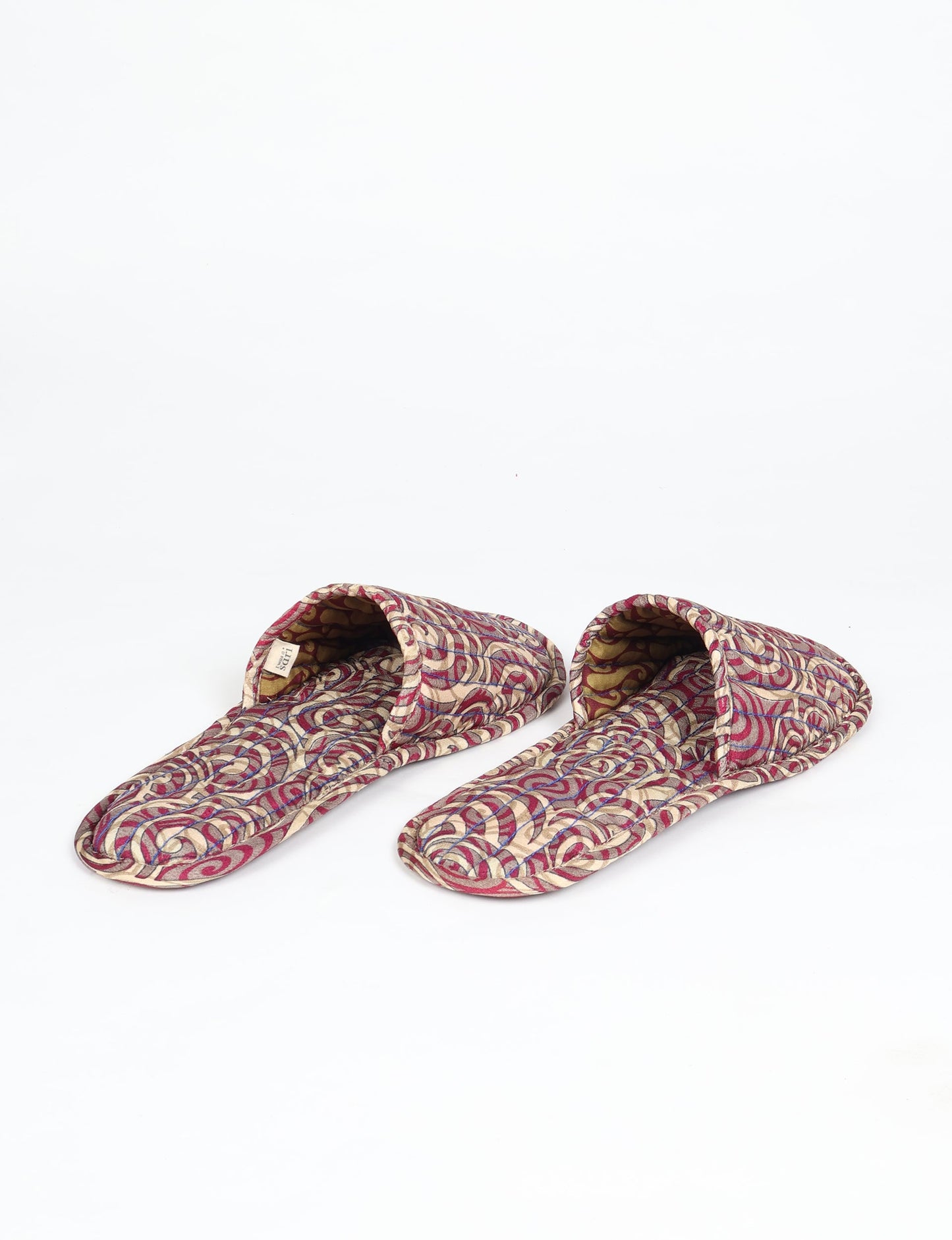 Elevate your downtime with our Quilted Slippers. Ethical, sustainable, and crafted by female artisans in Mumbai, these slippers offer cushioned comfort with a touch of chic style. Warm on the inside, fashionable on the outside, step into sustainable luxury.