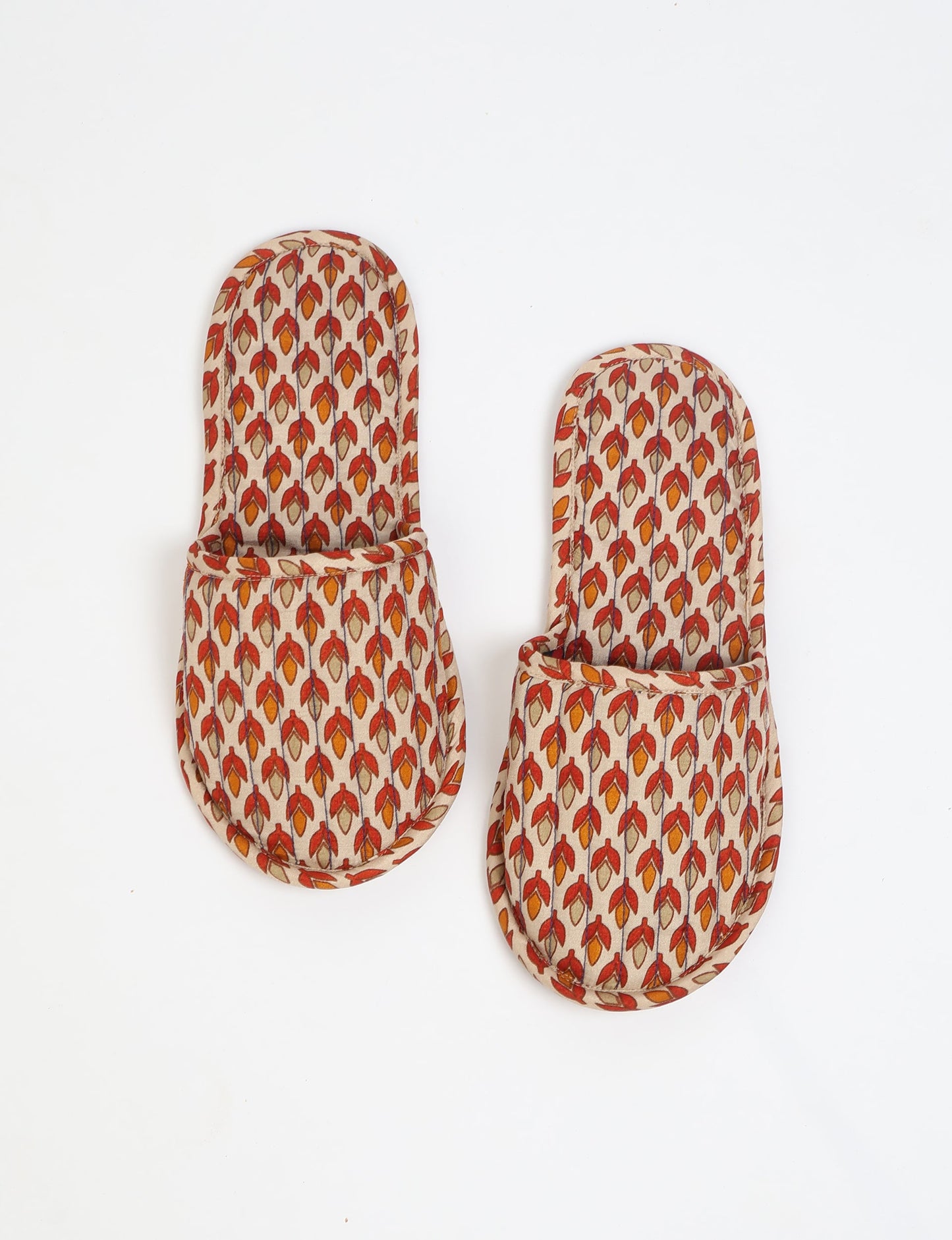 Elevate your downtime with our Quilted Slippers. Ethical, sustainable, and crafted by female artisans in Mumbai, these slippers offer cushioned comfort with a touch of chic style. Warm on the inside, fashionable on the outside, step into sustainable luxury.