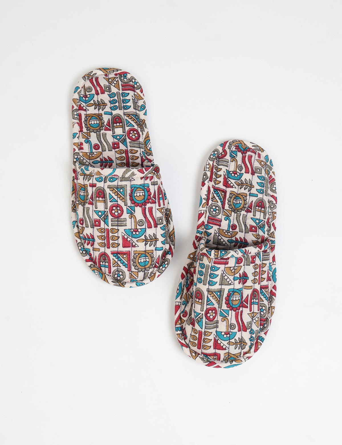 Elevate your downtime with our Quilted Slippers. Ethical, sustainable, and crafted by female artisans in Mumbai, these slippers offer cushioned comfort with a touch of chic style. Warm on the inside, fashionable on the outside, step into sustainable luxury.