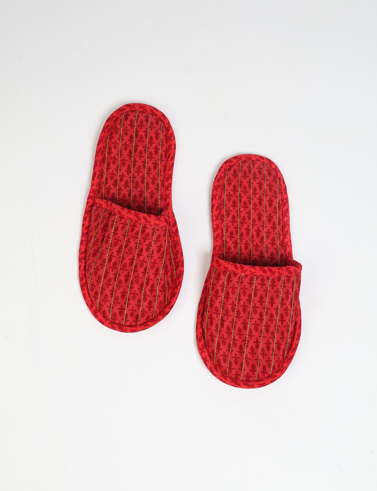 Elevate your downtime with our Quilted Slippers. Ethical, sustainable, and crafted by female artisans in Mumbai, these slippers offer cushioned comfort with a touch of chic style. Warm on the inside, fashionable on the outside, step into sustainable luxury.