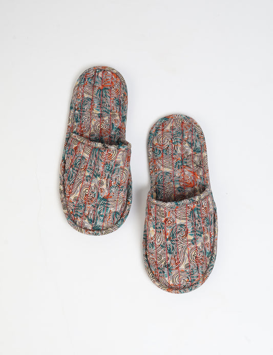Elevate your downtime with our Quilted Slippers. Ethical, sustainable, and crafted by female artisans in Mumbai, these slippers offer cushioned comfort with a touch of chic style. Warm on the inside, fashionable on the outside, step into sustainable luxury.