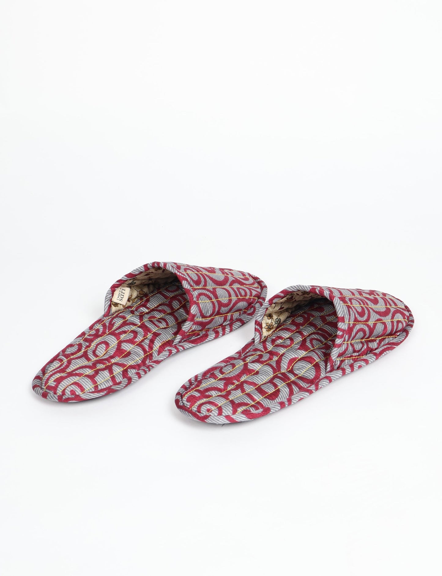 Elevate your downtime with our Quilted Slippers. Ethical, sustainable, and crafted by female artisans in Mumbai, these slippers offer cushioned comfort with a touch of chic style. Warm on the inside, fashionable on the outside, step into sustainable luxury.