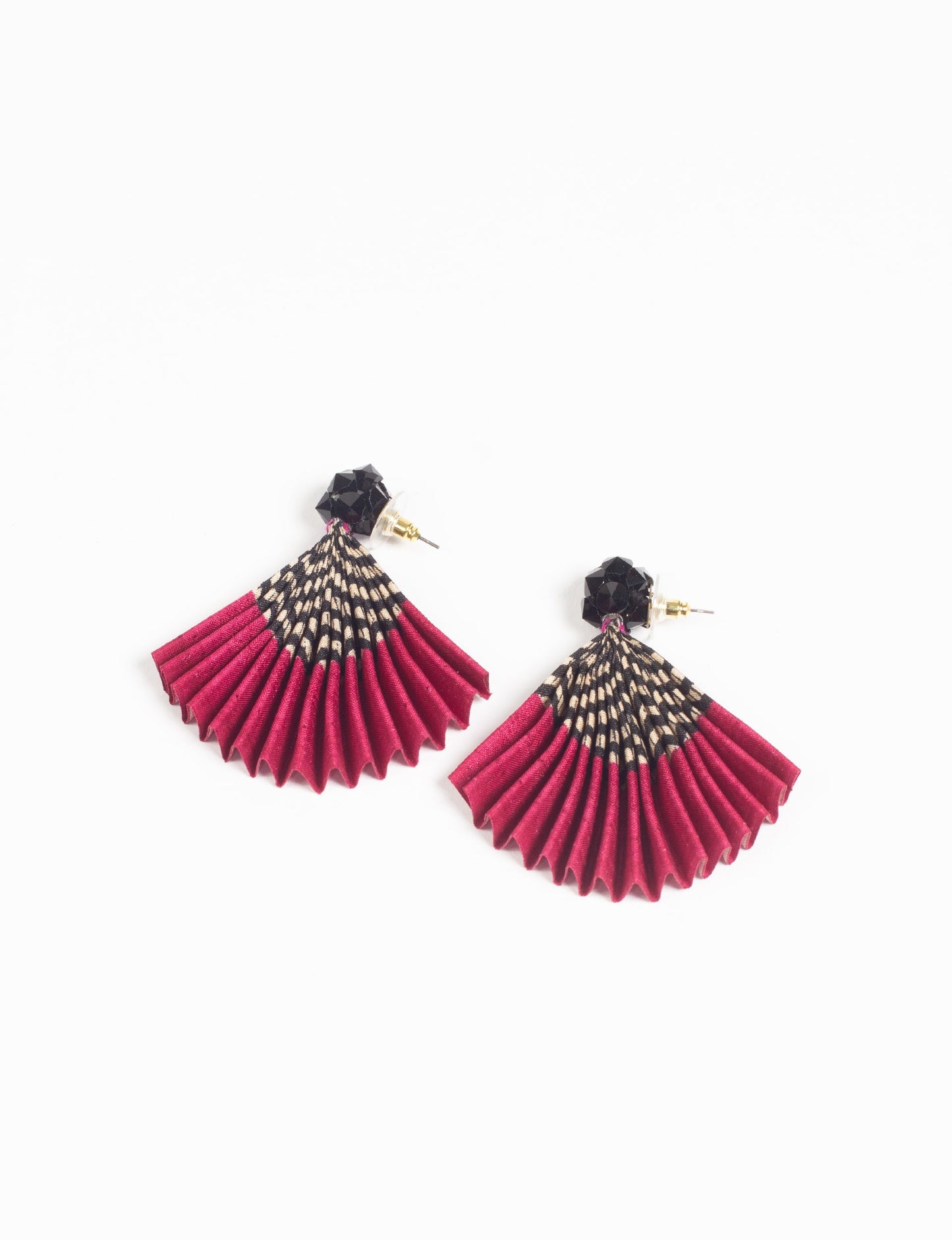 Elevate your style sustainably with our PLEATED EARRINGS – a harmonious blend of ethical fashion and eco-conscious design. Fashioned using innovative heat setting techniques on pre-loved Indian saris, these accessories showcase a commitment to slow fashion and upcycled fashion. Enjoy planet-friendly charm with hypoallergy tested metal hooks, nickel, and lead-free for a skin-friendly touch.