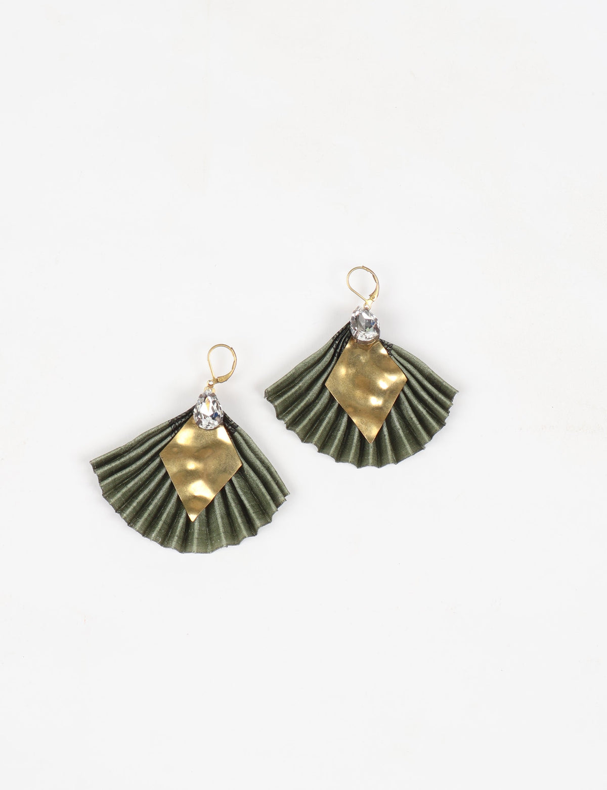 Pleated earrings in green fabric with gold diamond-shaped metal and clear teardrop gem accents, shown flat on white background