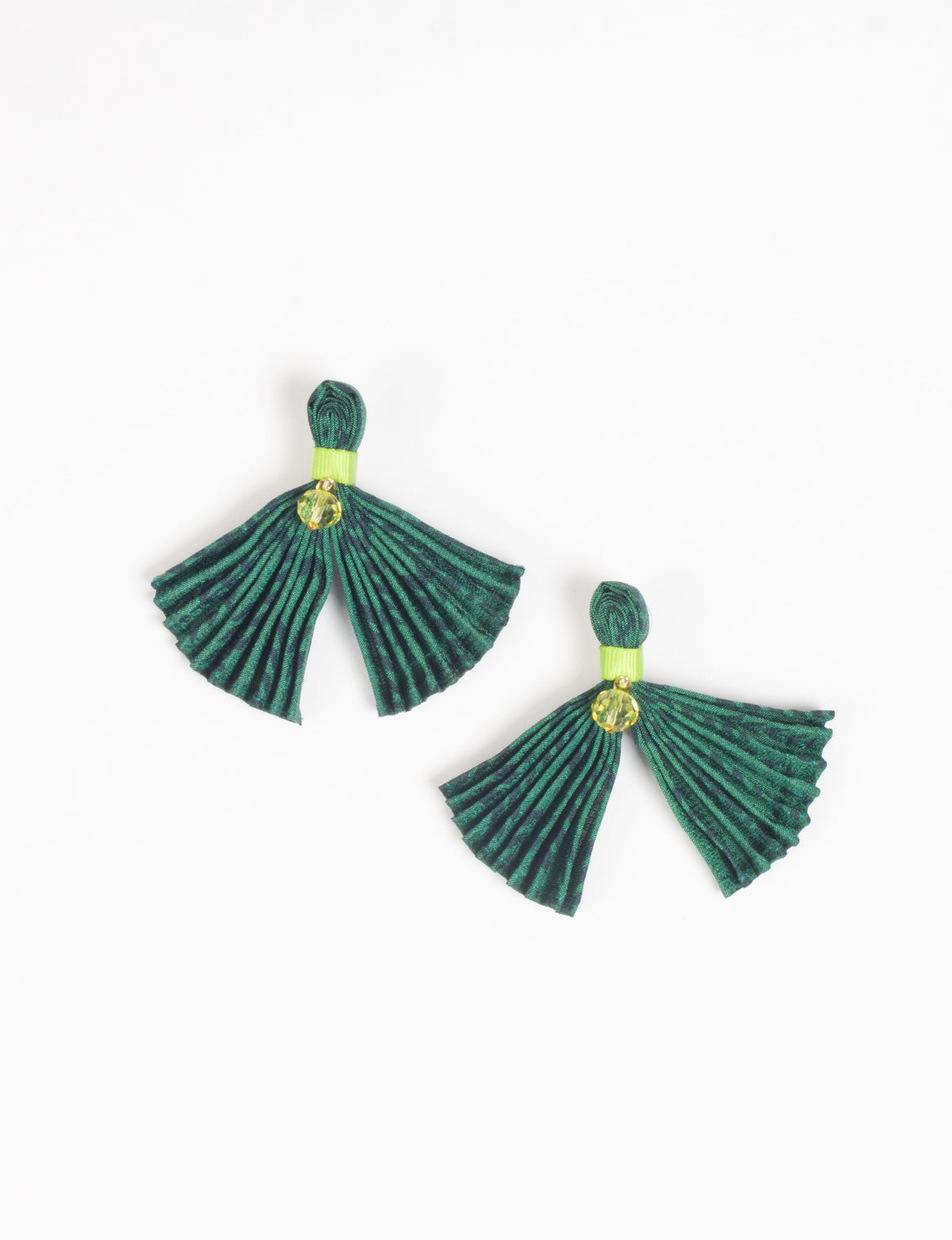 Green abstract pleated fabric earrings with yellow bead accents, shown flat on a white background