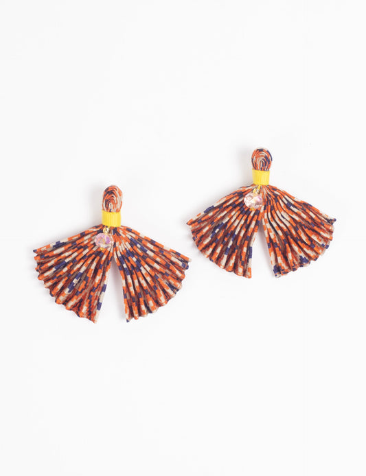 Adorn yourself sustainably with our PLEATED EARRINGS – fan-shaped wonders with a top knot and a tiny stone. Meticulously hand-pleated from Indian saris, these earrings reflect ethical clothing, green fashion, and slow fashion. Fastened with hypoallergy tested metal hooks, nickel, and lead-free, making them a conscious and stylish accessory.