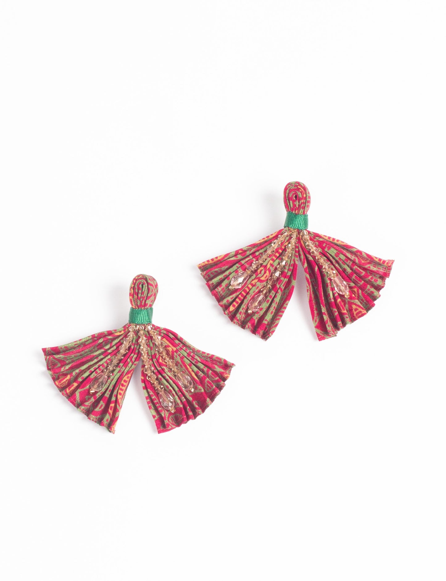 Elevate your look with our PLEATED EARRINGS – embellished with a beaded dangler, diamond-shaped metallic plate, and hook fastening. Crafted with innovative heat setting techniques on pre-loved saris, these earrings showcase ethical clothing, green fashion, and zero waste fashion. Hypoallergy tested metal hooks, nickel, and lead-free for a conscious and stylish accessory.